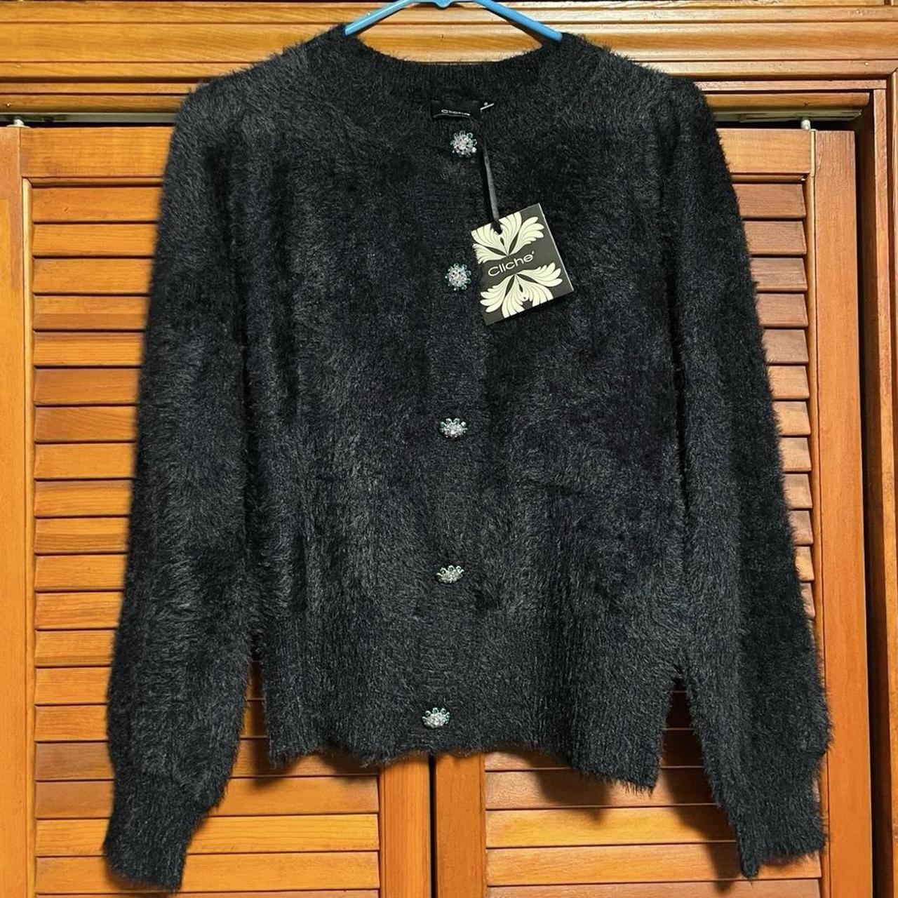 This is a black faux fur long sleeve rhinestone. Depop