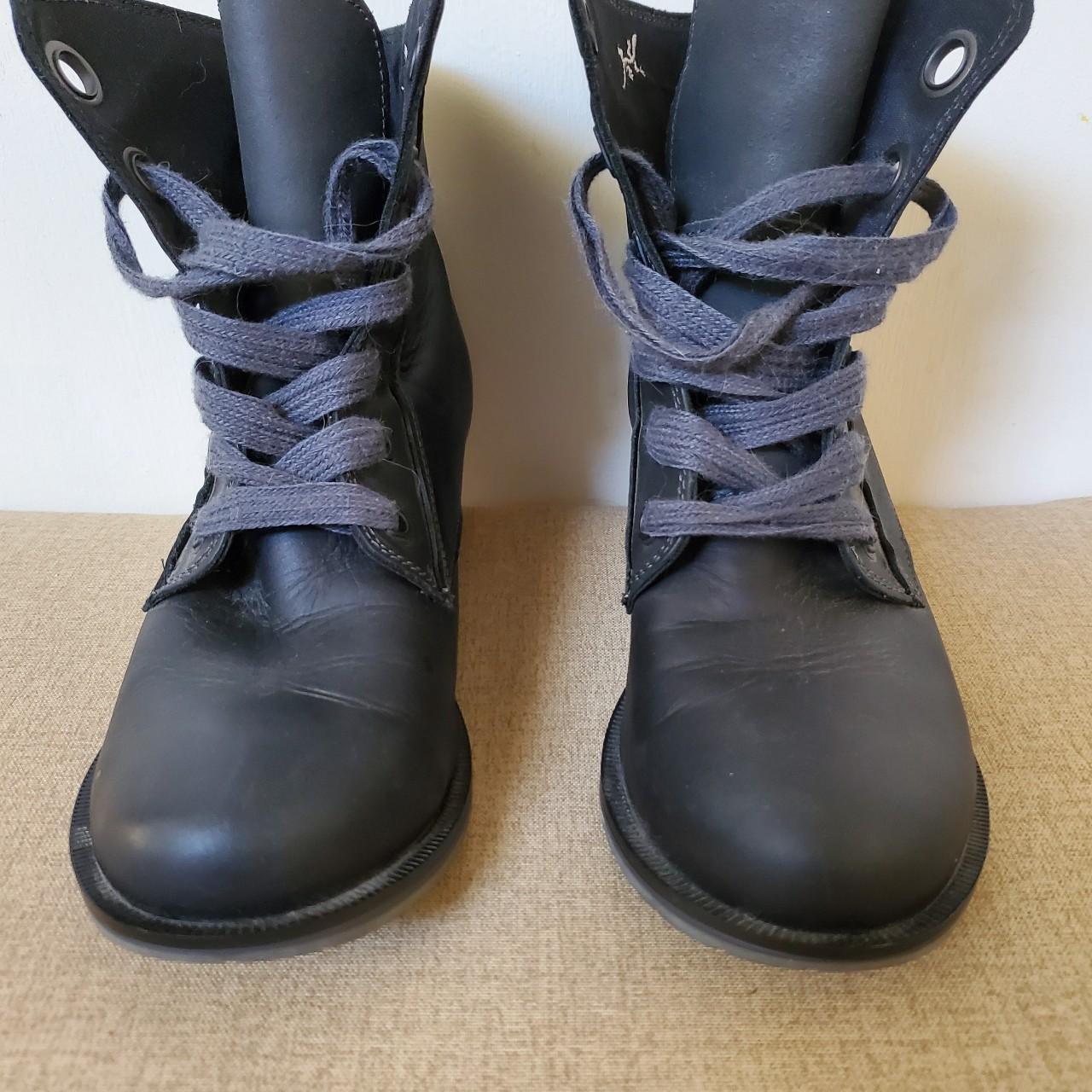 A pair of Chaco s women s black lace up boots with Depop