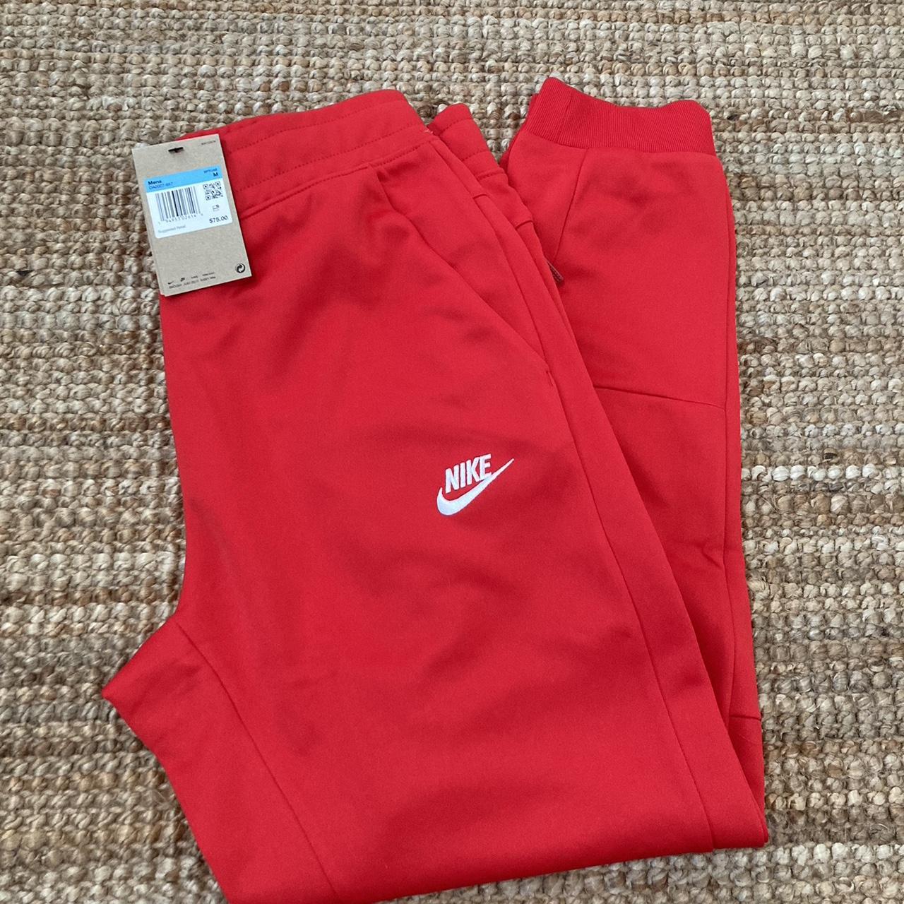 Nike tribute sale joggers red