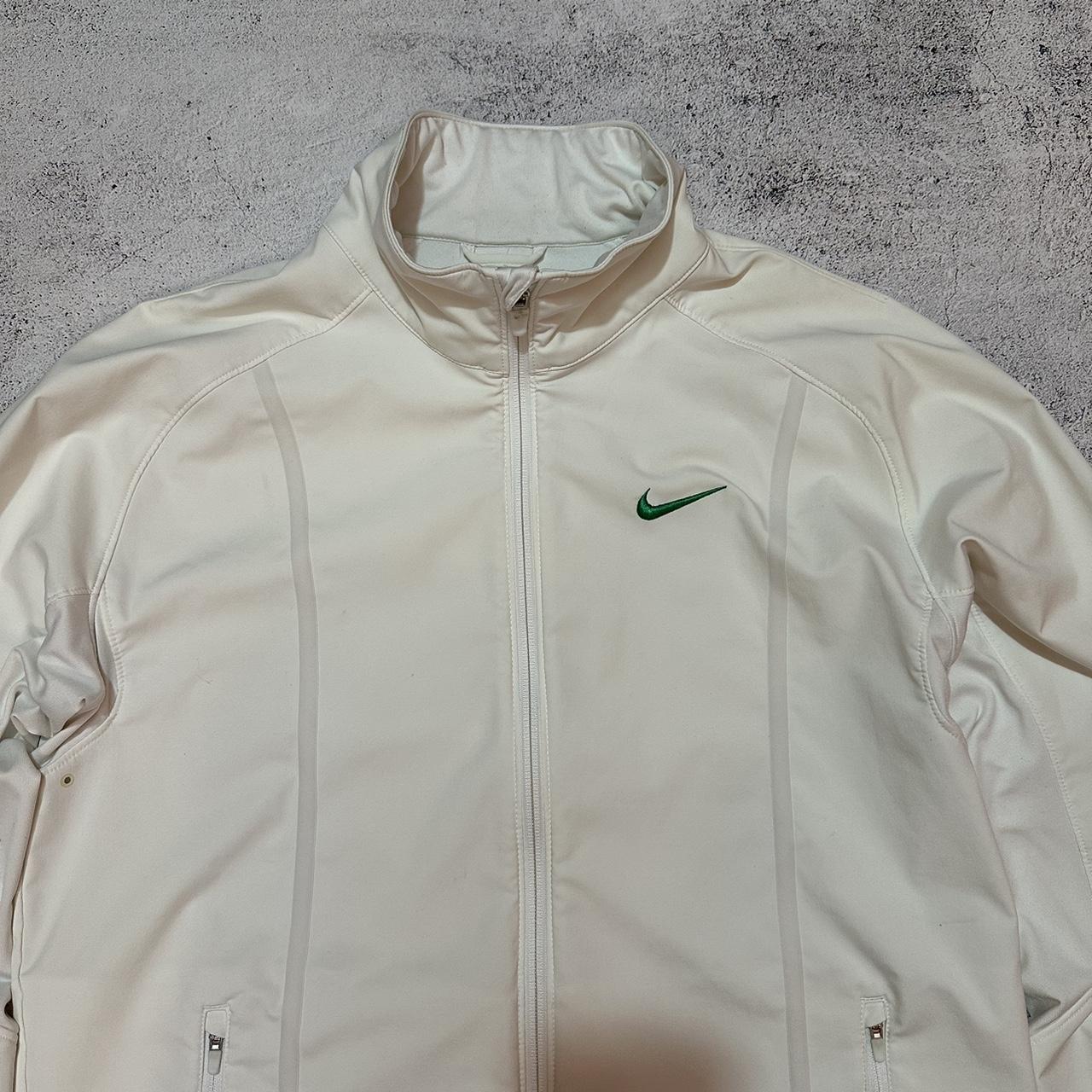 roger federer white jacket