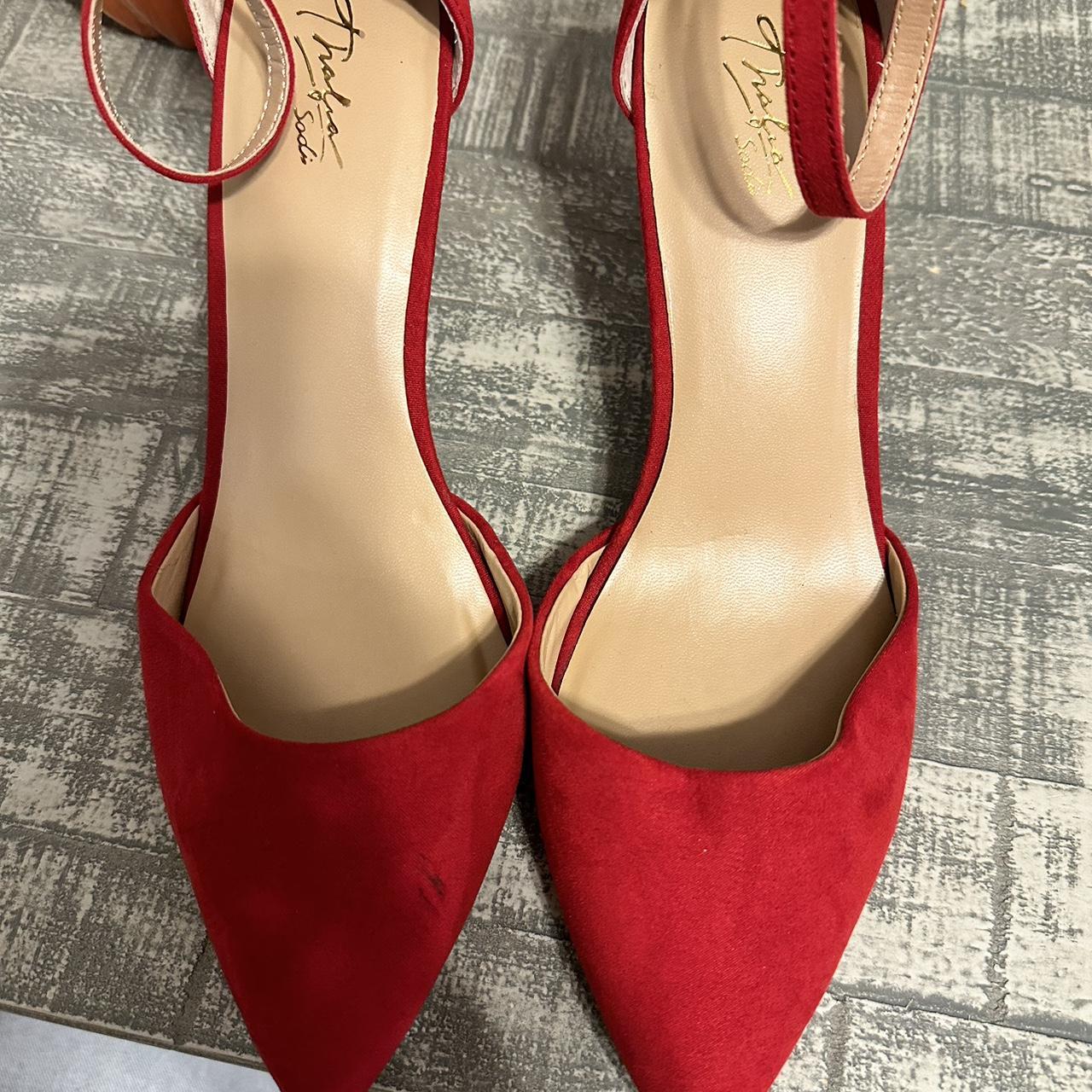 Red heals 2 inch Right shoe a black spot - Depop