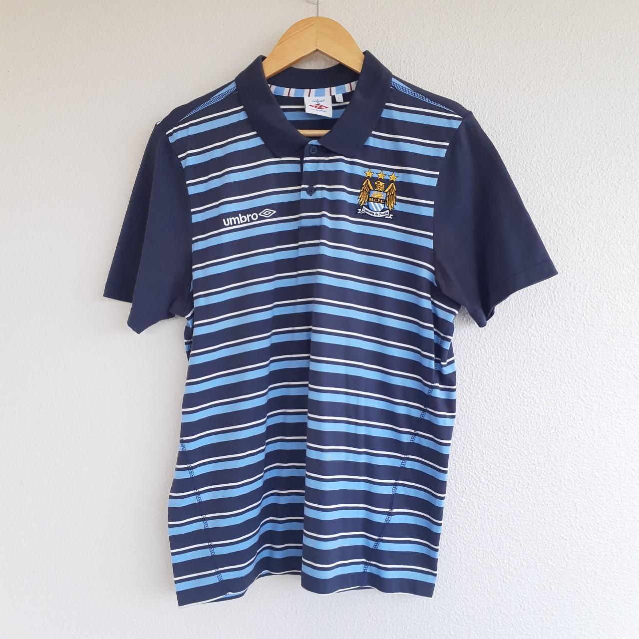 Umbro Men's Blue Polo-shirts | Depop