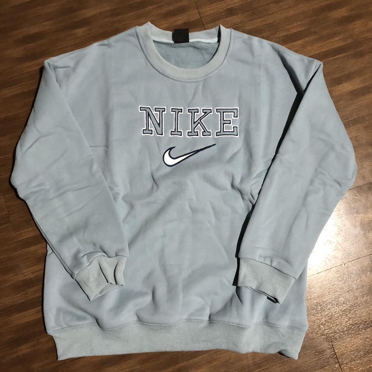 Blue nike spellout discount sweatshirt