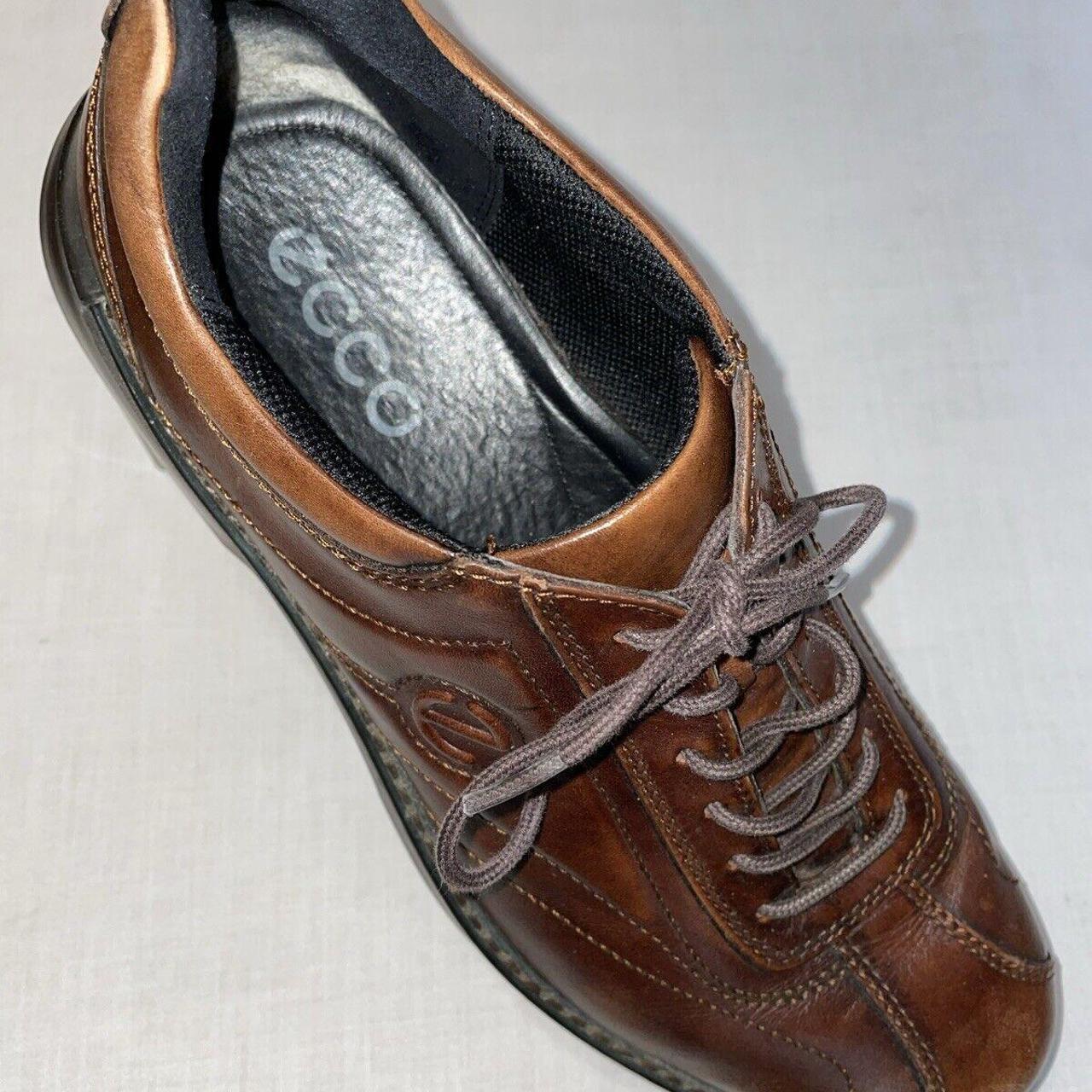 This mens brown leather pair of Ecco casual shoes. Depop