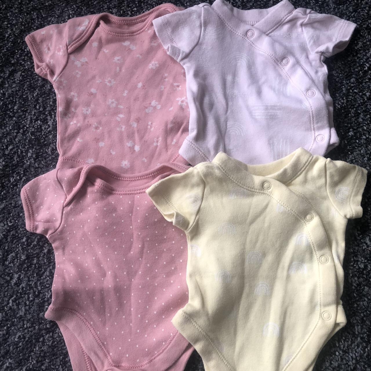 Tiny baby clothes bundle Includes vests, 2 outfits,... Depop