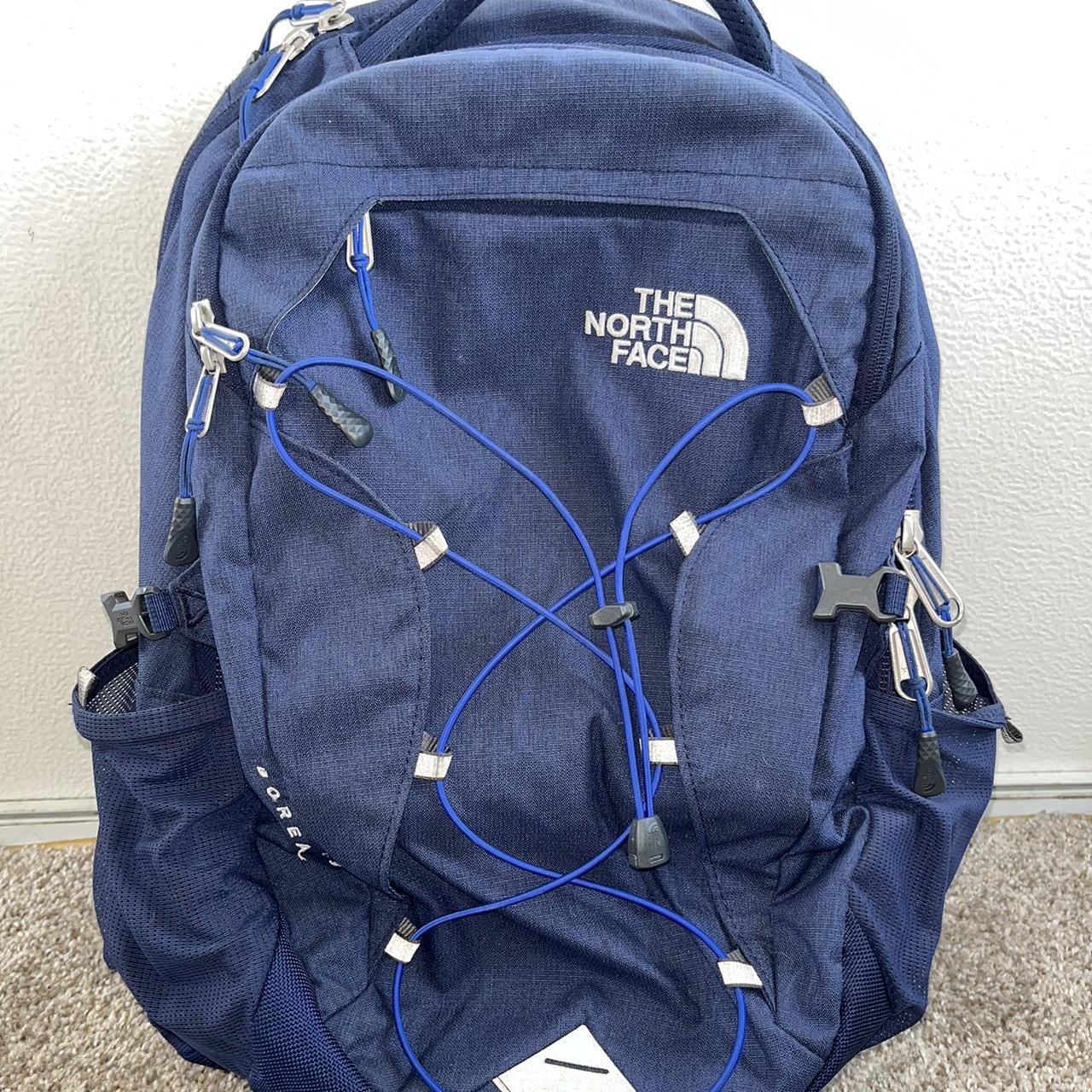 North face navy sales blue backpack