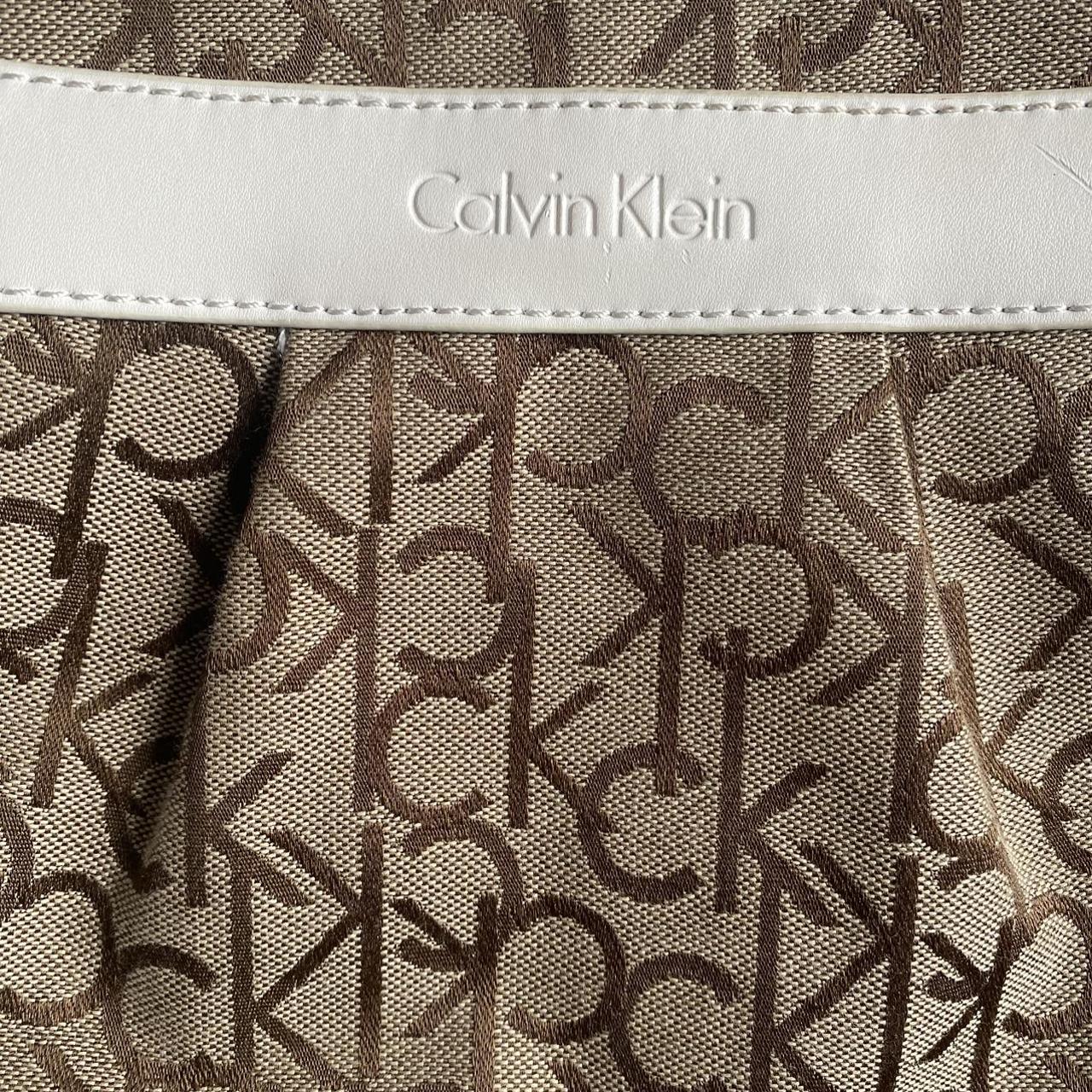 White and brown crossbody Calvin Klein bag. Has CK - Depop