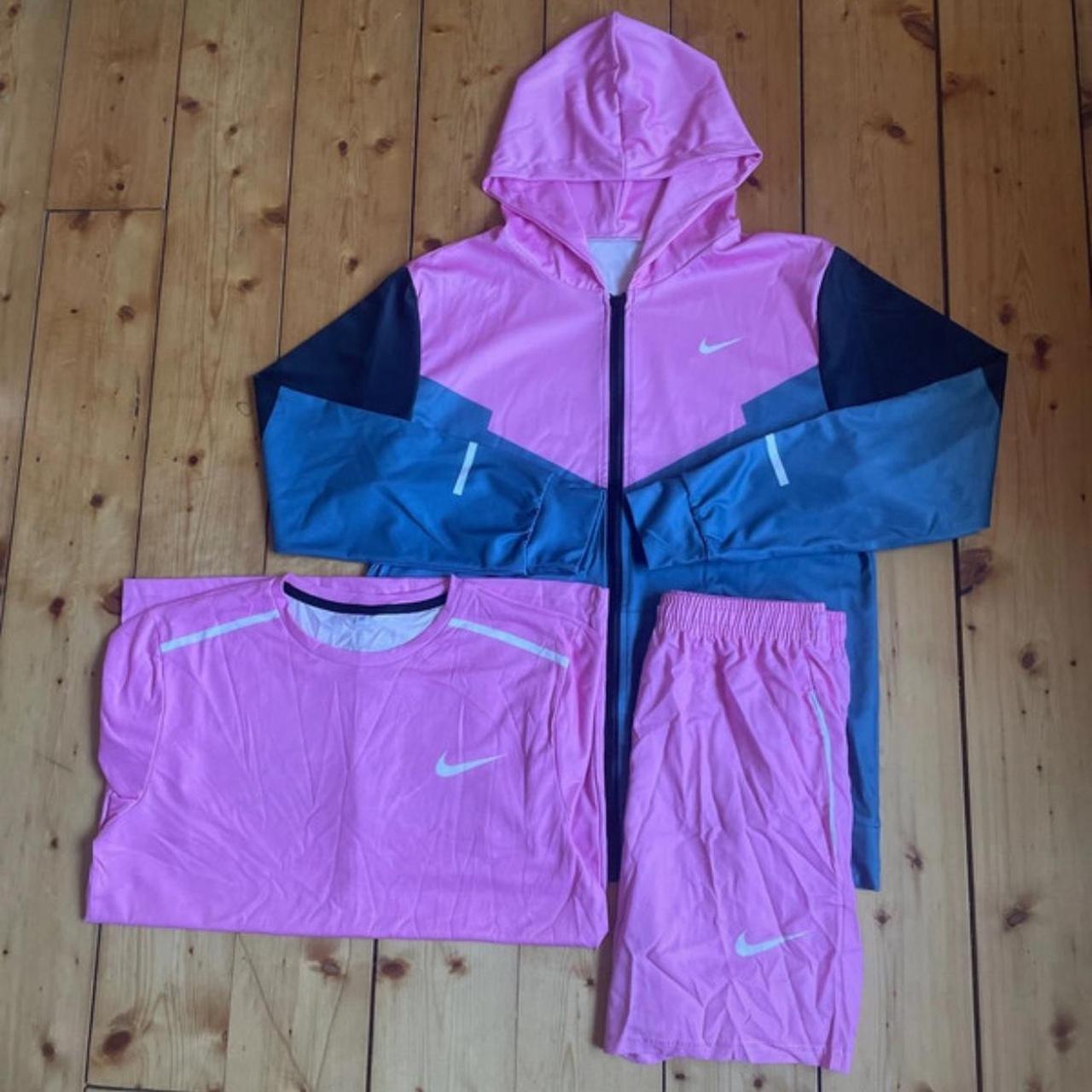 mens pink nike jumpsuit