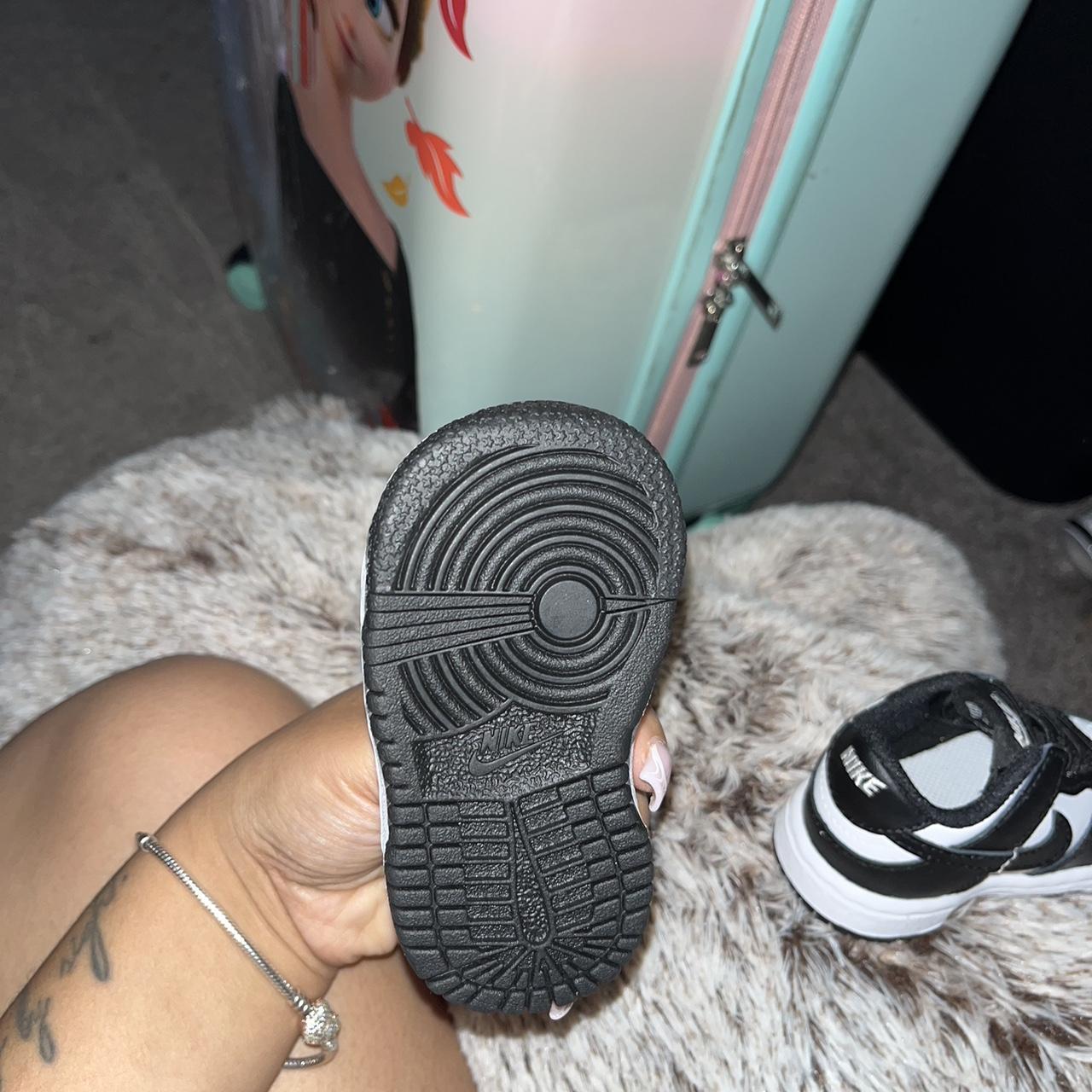 low top dunks black and white