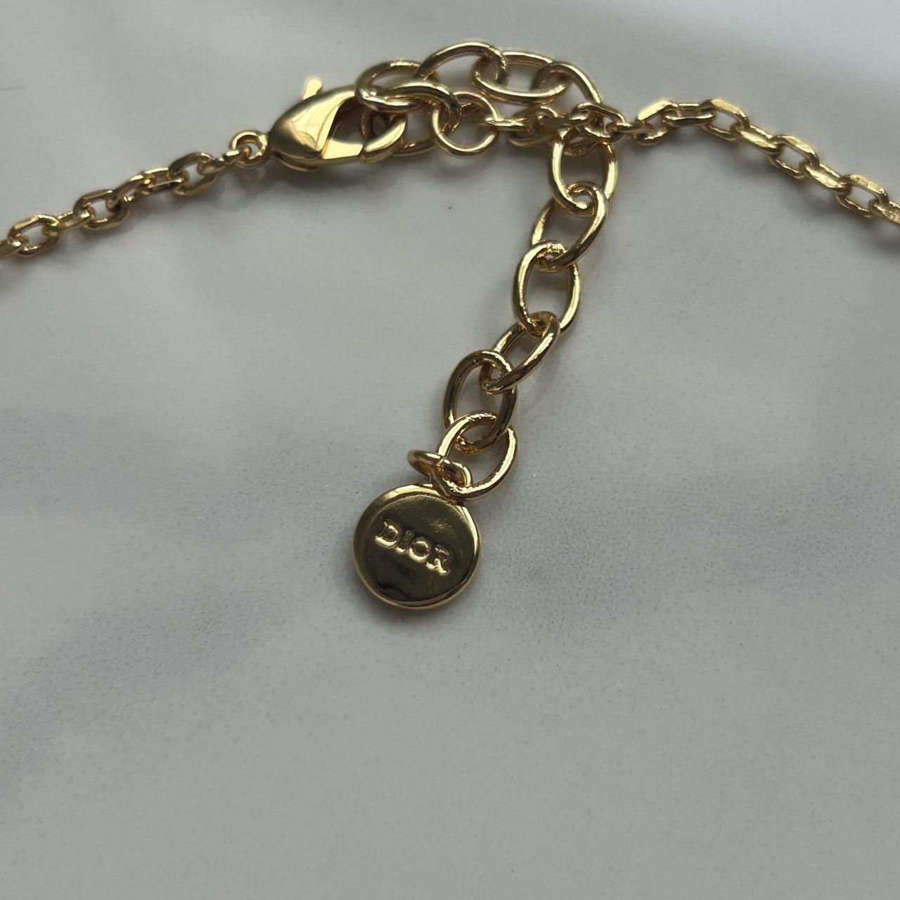 Dior gold-finish revolution necklace Original... - Depop