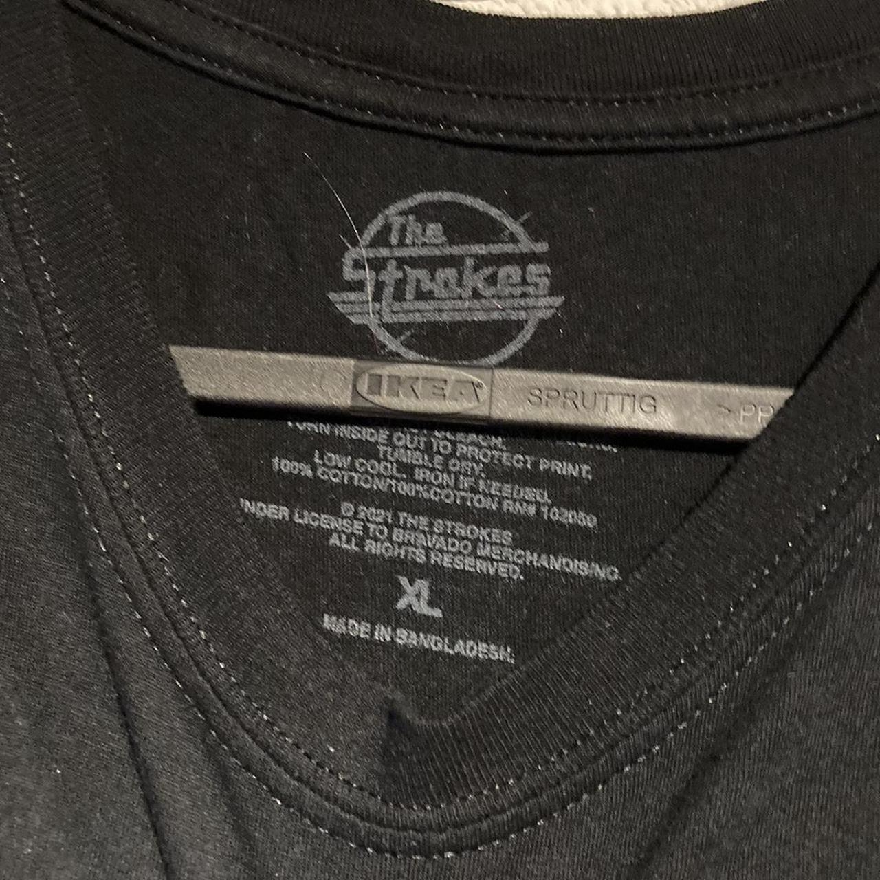 the strokes shirt hot topic