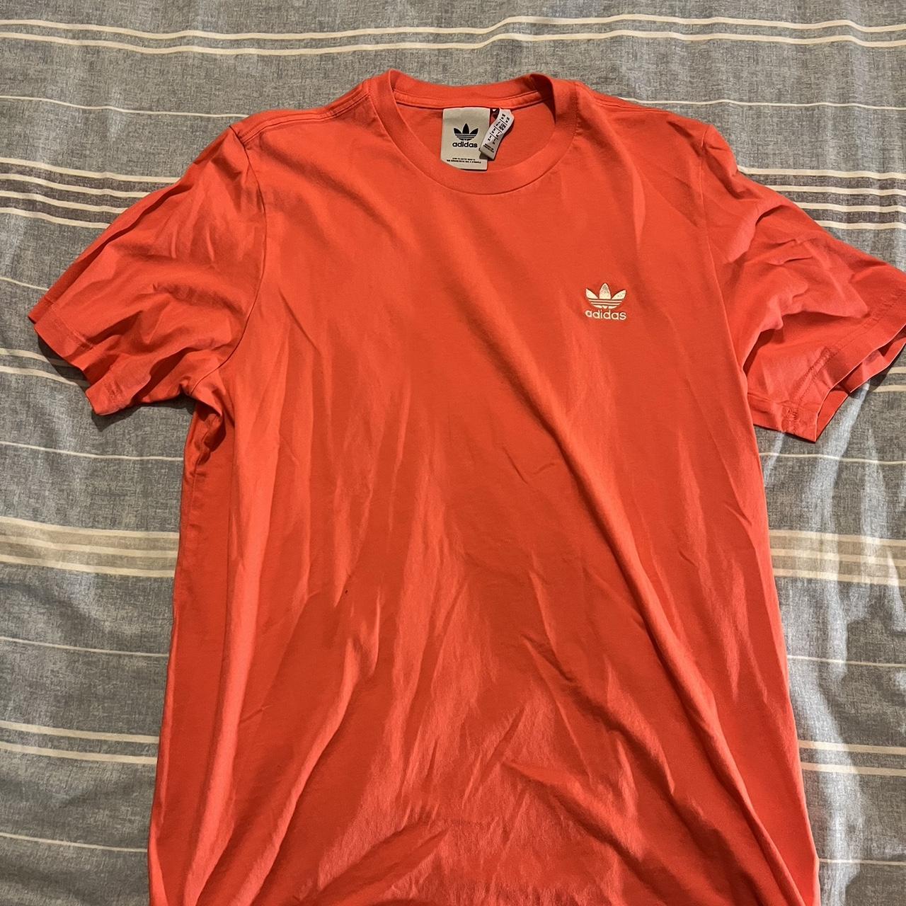 Peach color adidas shirt online