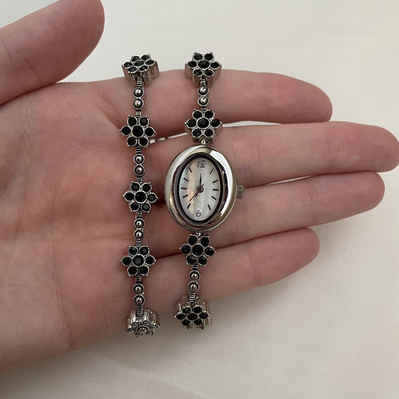 This vintage Avon watch and bracelet set is the... - Depop