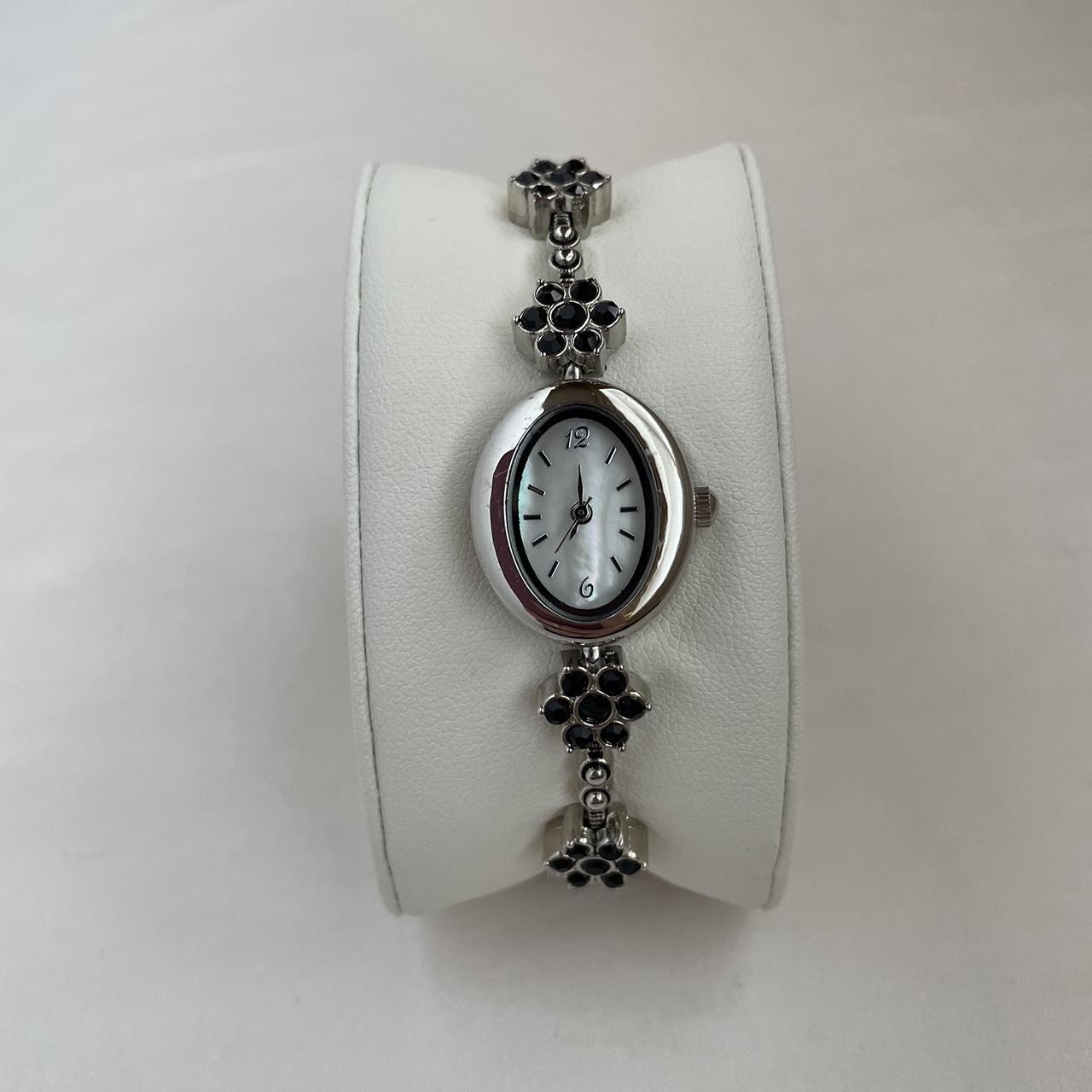 This vintage Avon watch and bracelet set is the... - Depop