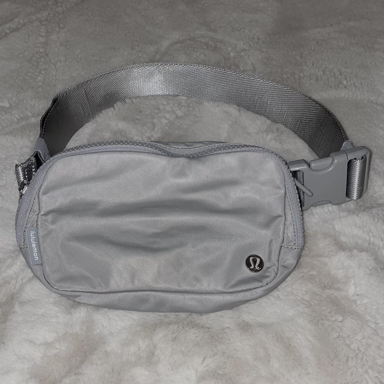 black sherpa lululemon fanny pack with gold - Depop