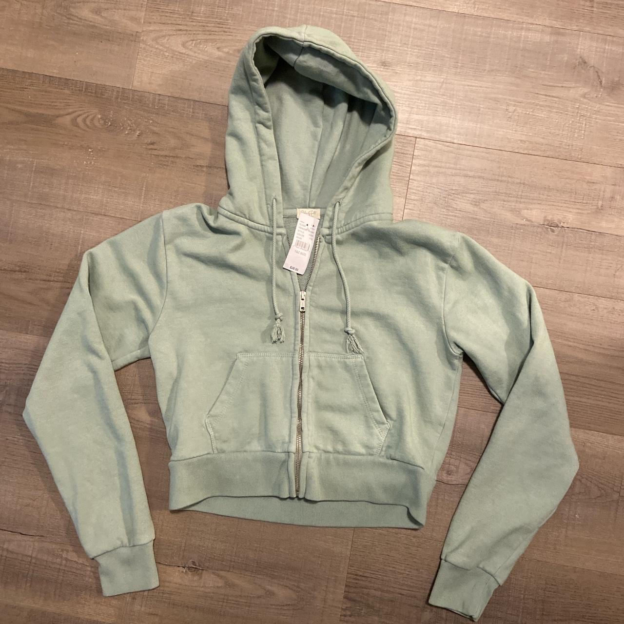 Brandy Melville sage green cropped zip up. New with... Depop