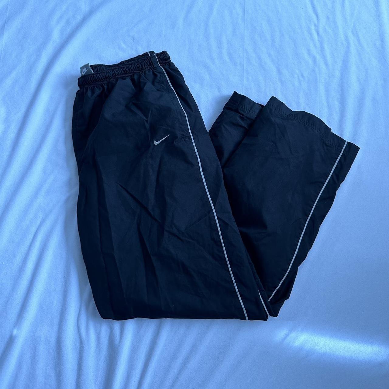 Y2K Nike track pants elastic waist zippered... Depop