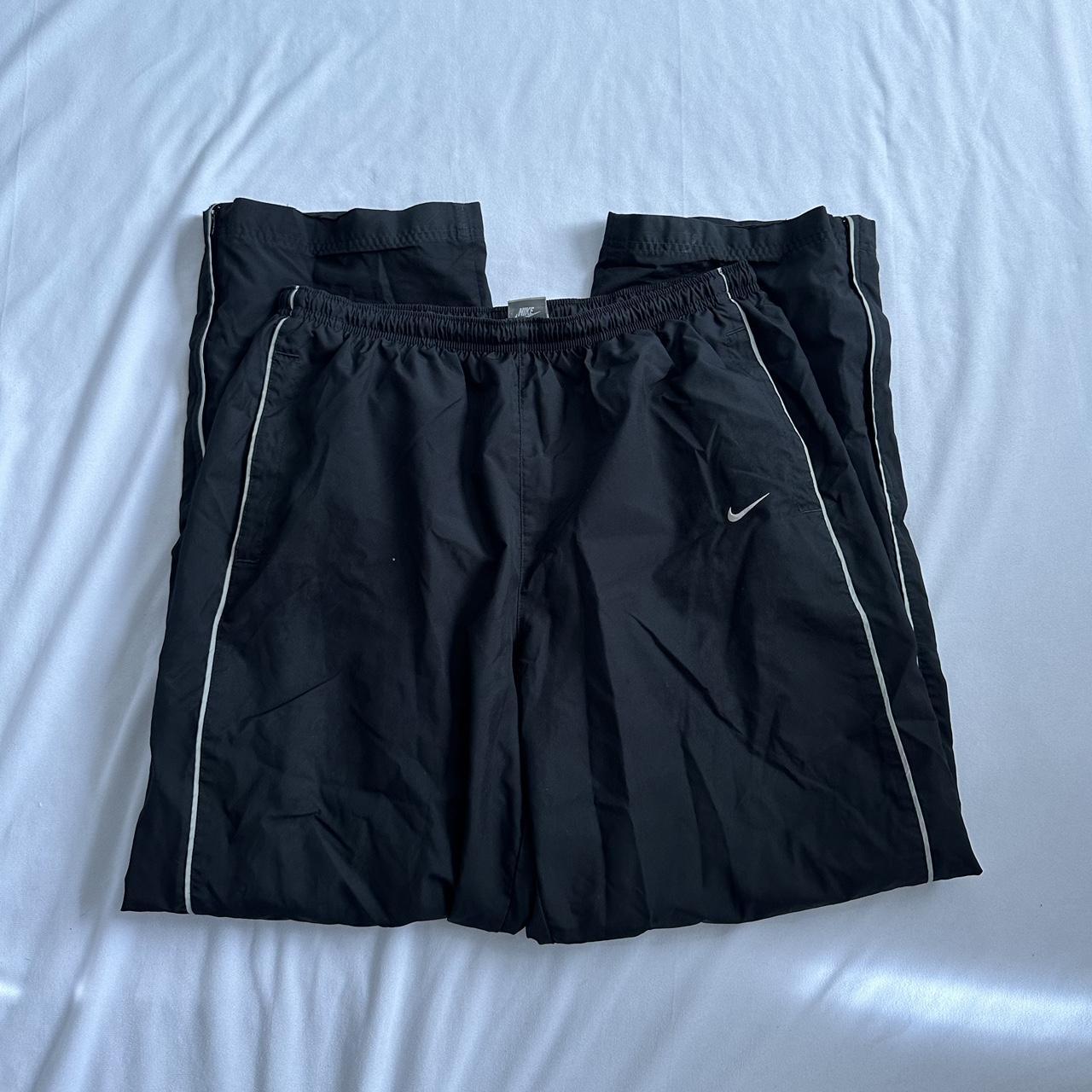 Y2K Nike track pants elastic waist zippered... Depop