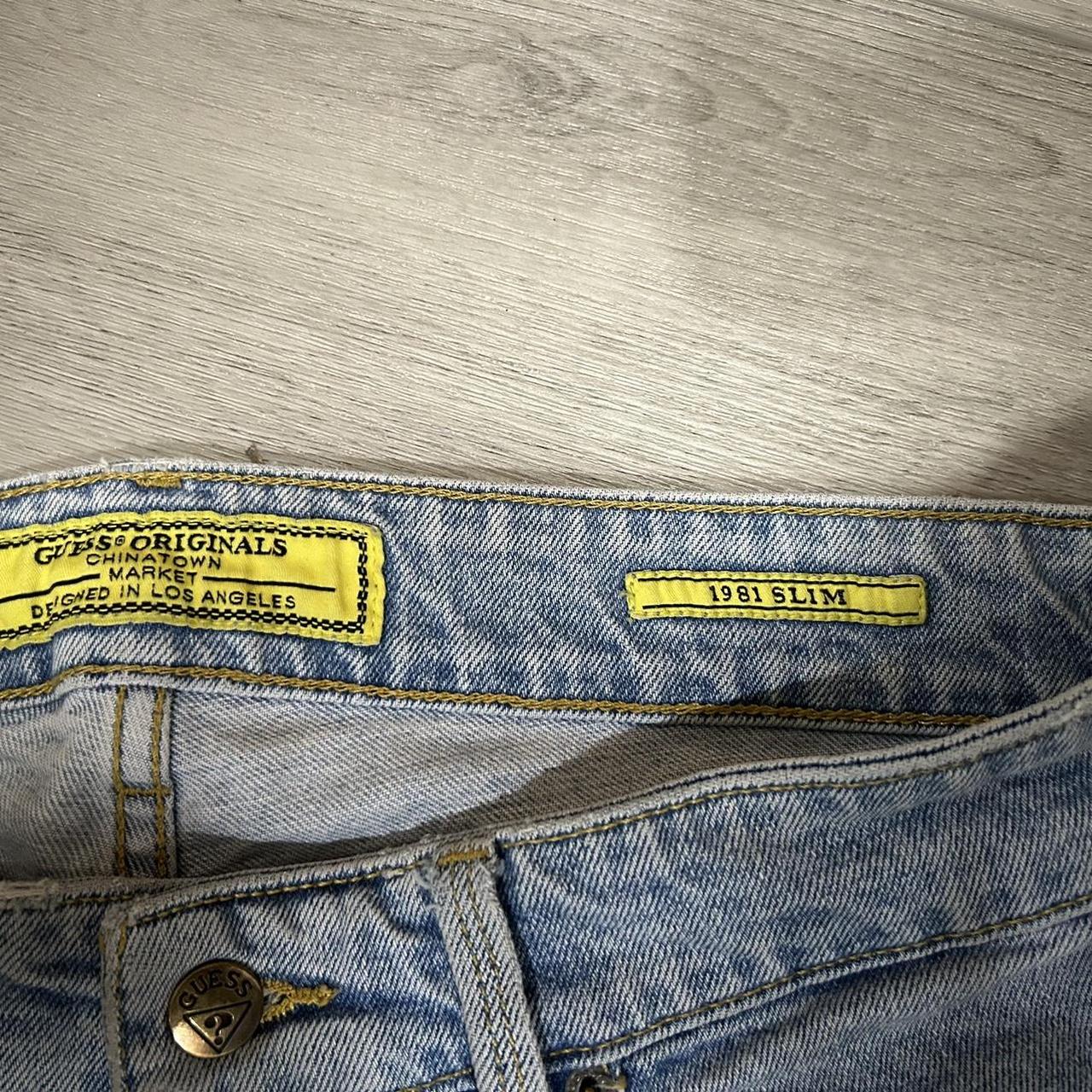 Guess originals x Chinatown market smiley jeans