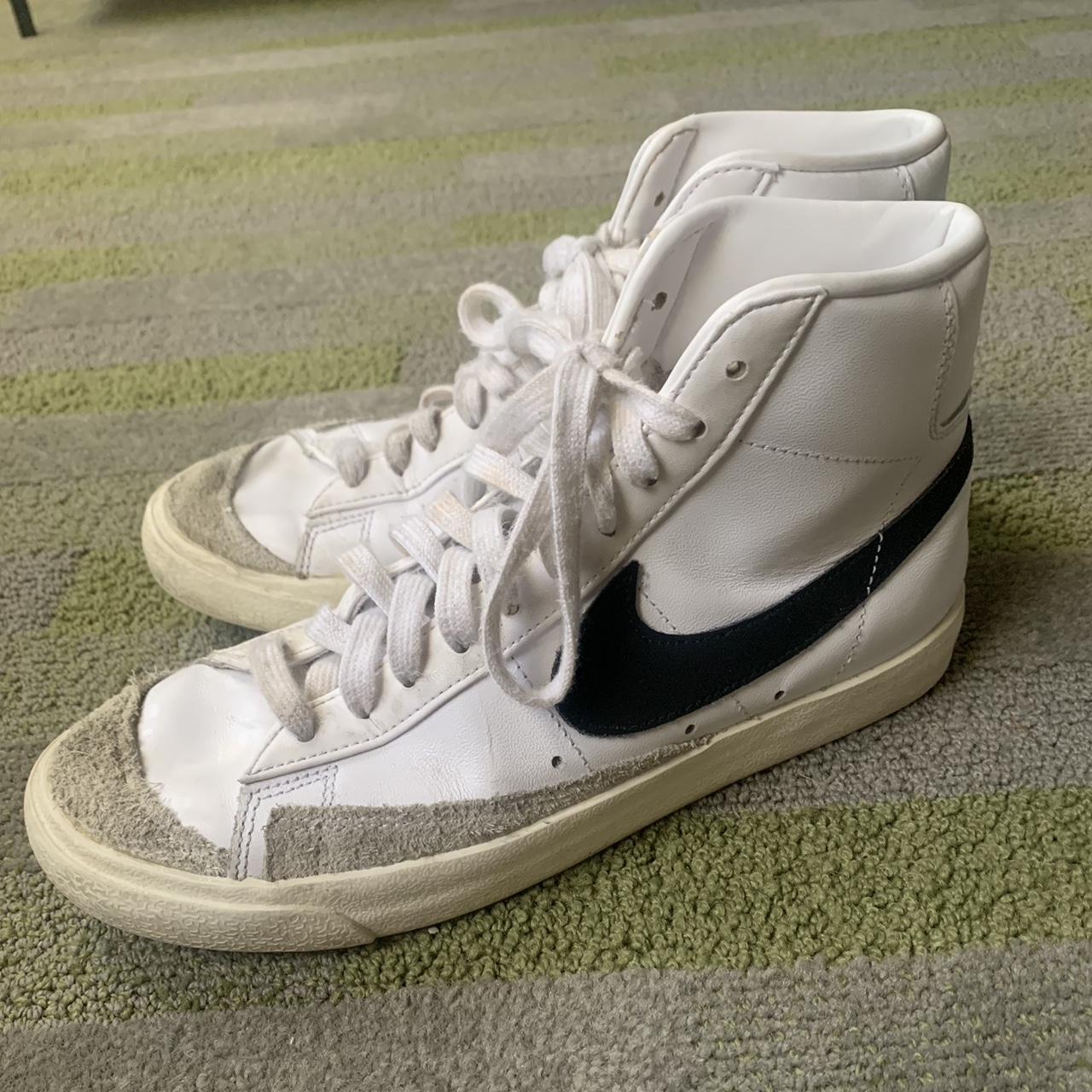 all white low top nike blazers