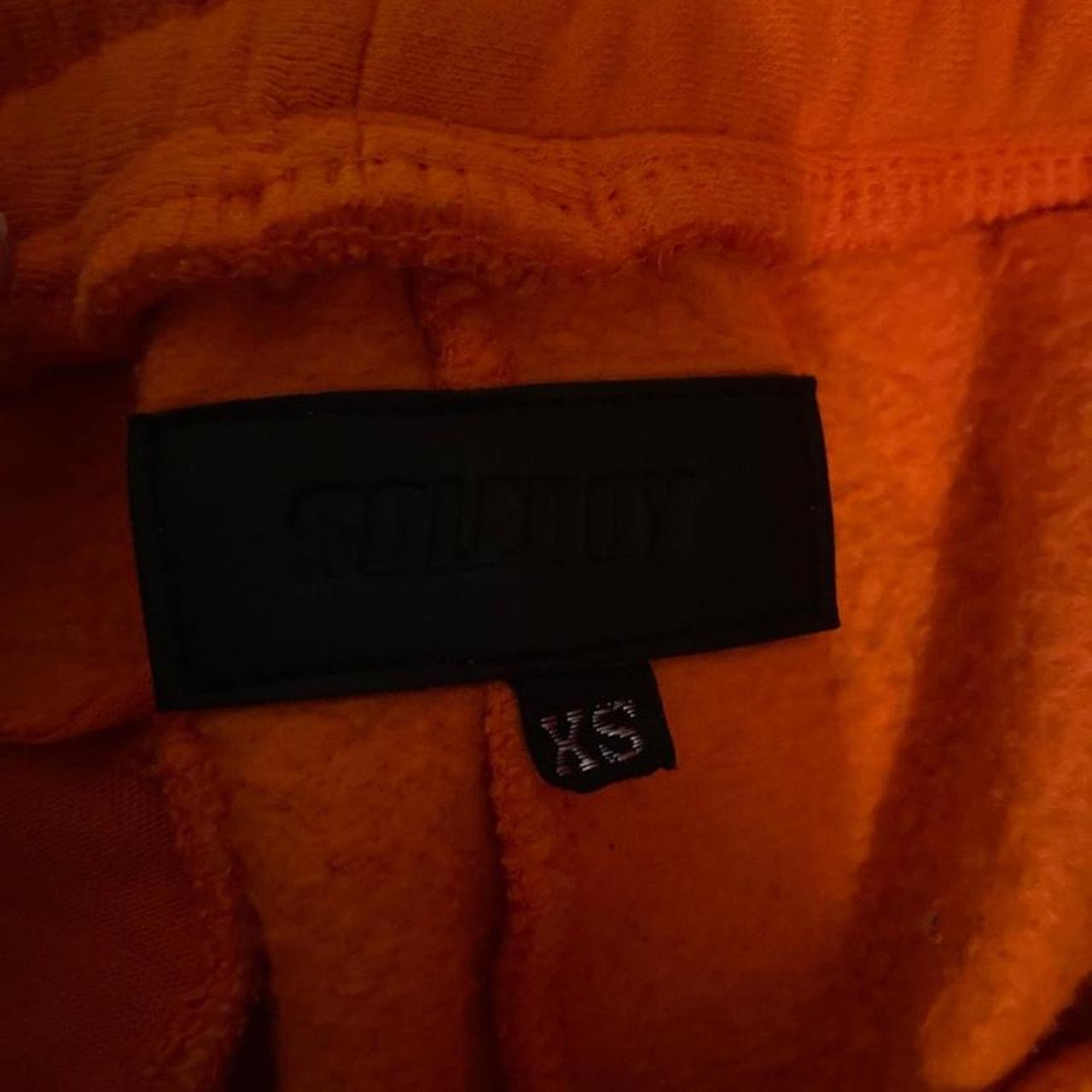 Soleboy lightning sweatpants. Orange with blue... Depop