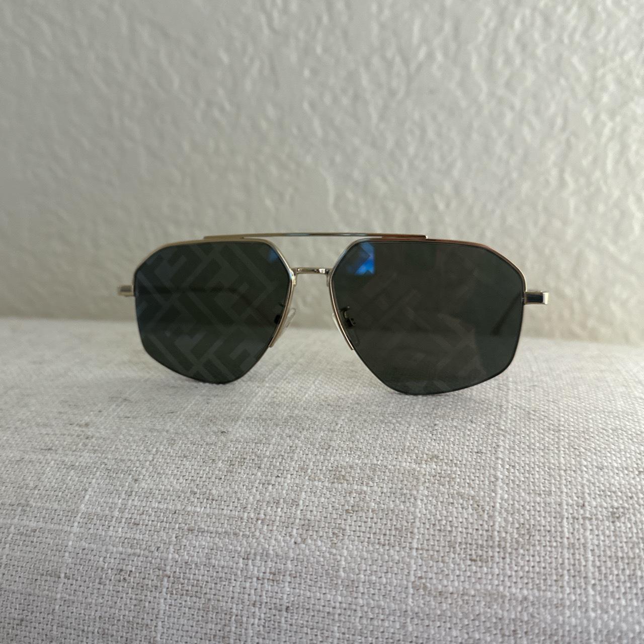 Fendi sunglasses with gold frame. Monogram on the... - Depop