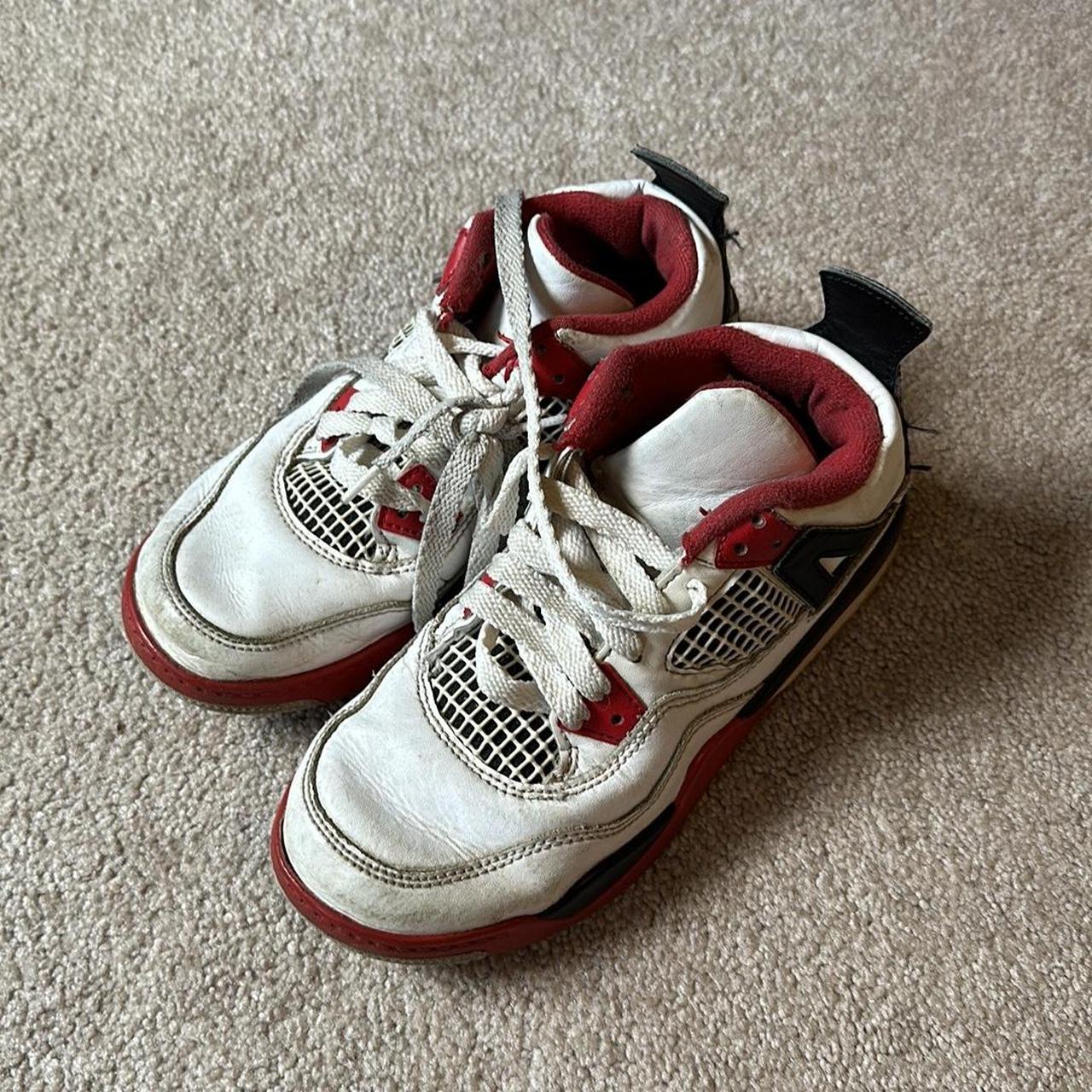 red and white jordan fours