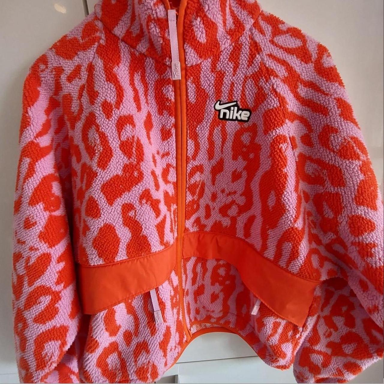 Nike pink and red leopard fleece jacket. Size XS