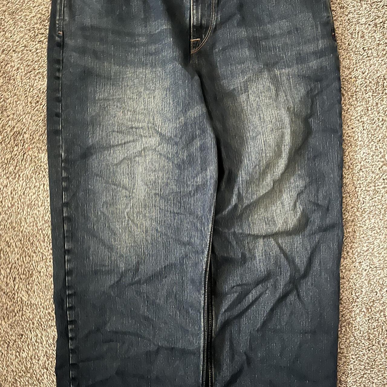 faded loose dark blue jeans I bought them in... Depop