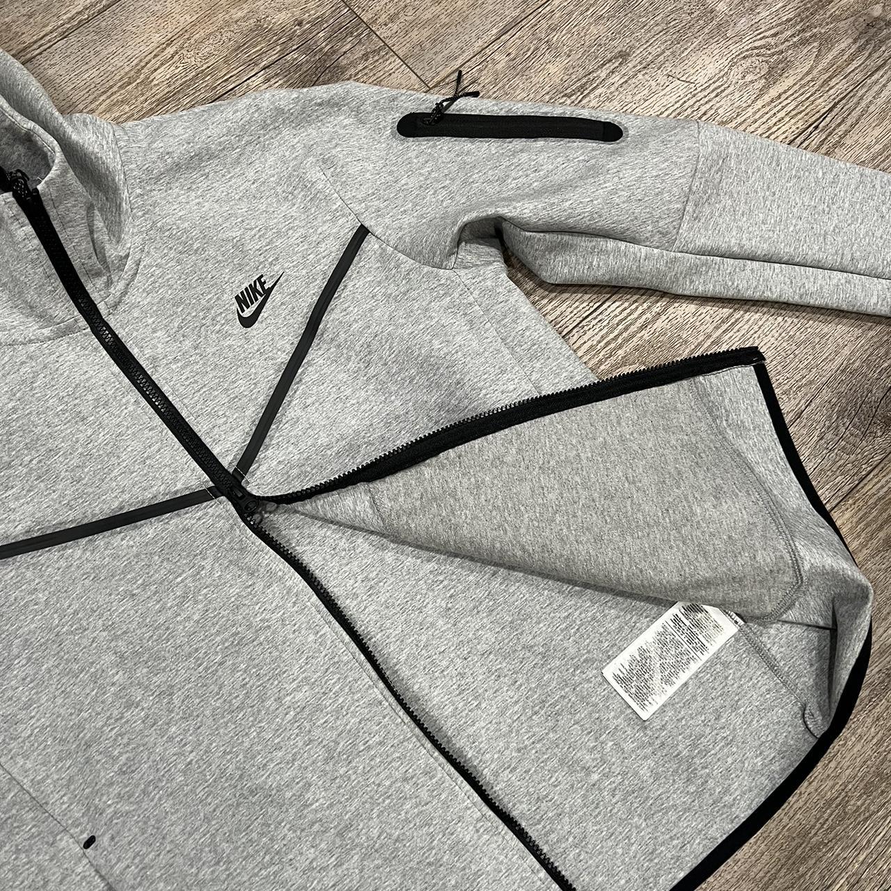 dark gray nike tech fleece
