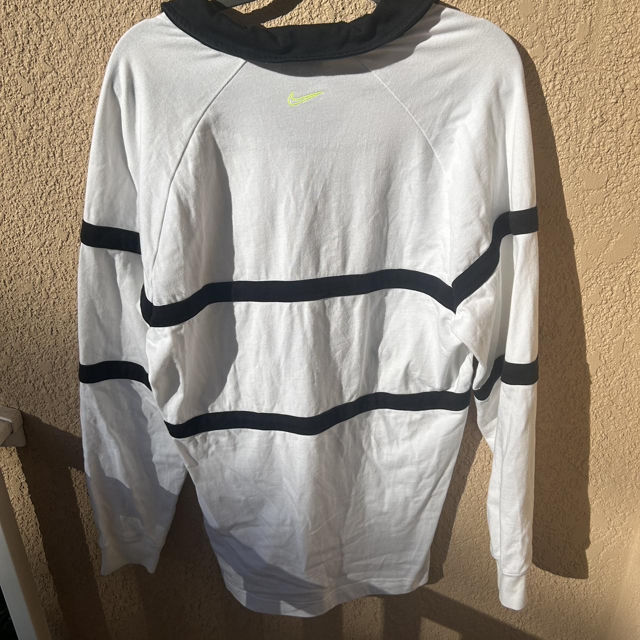 swoosh nike rugby shirt