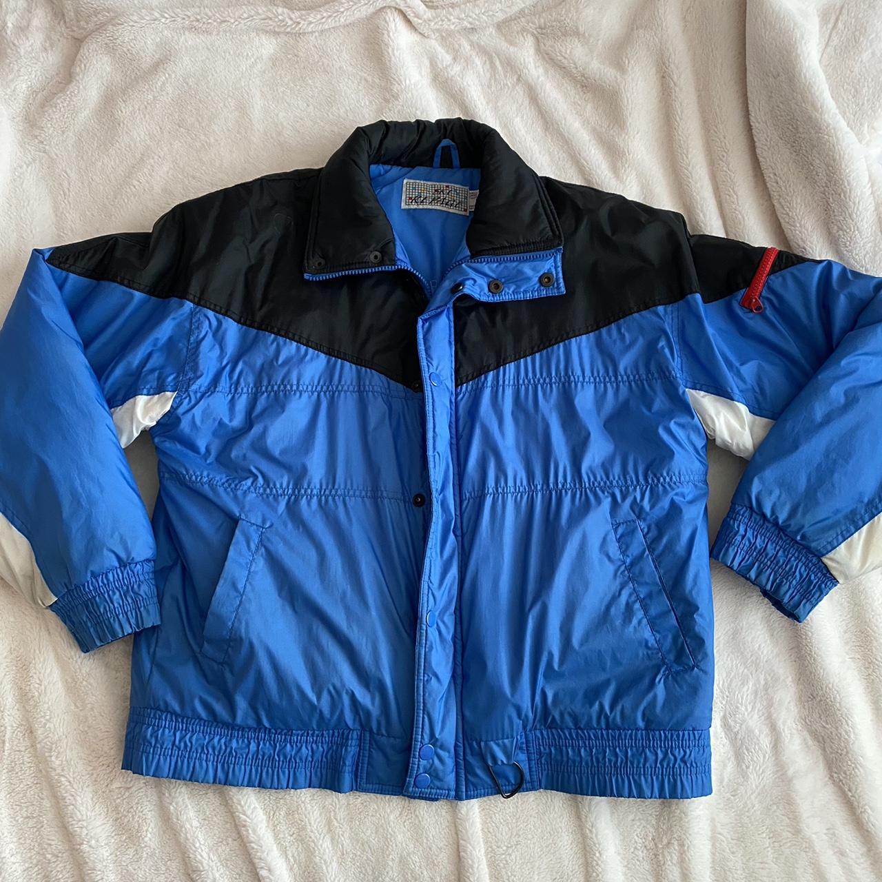 Vintage blue and black ski jacket from late... Depop