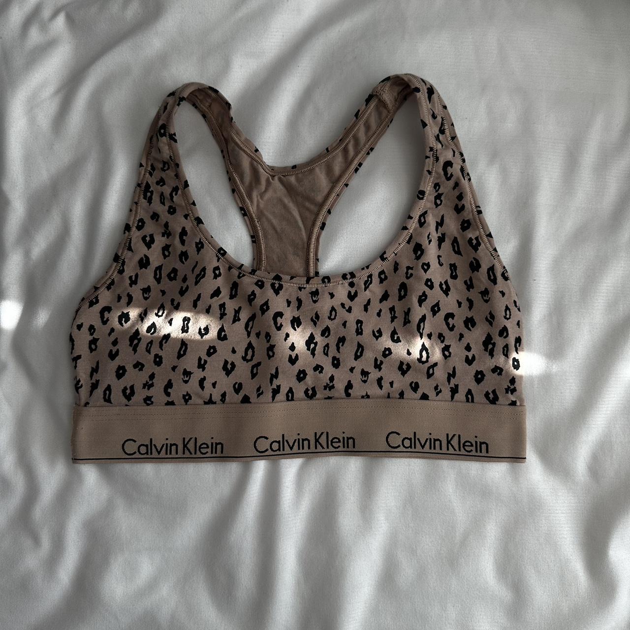 Calvin Klein Leapod slithery print fake