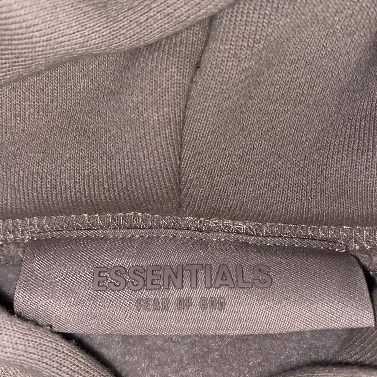 Tan Essentials hoodie, like new, need to get rid. - Depop