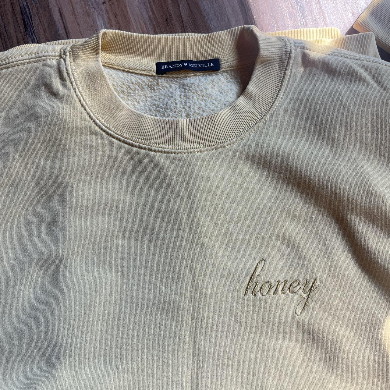 medium yellow brandy melville crew neck. Does have a... Depop