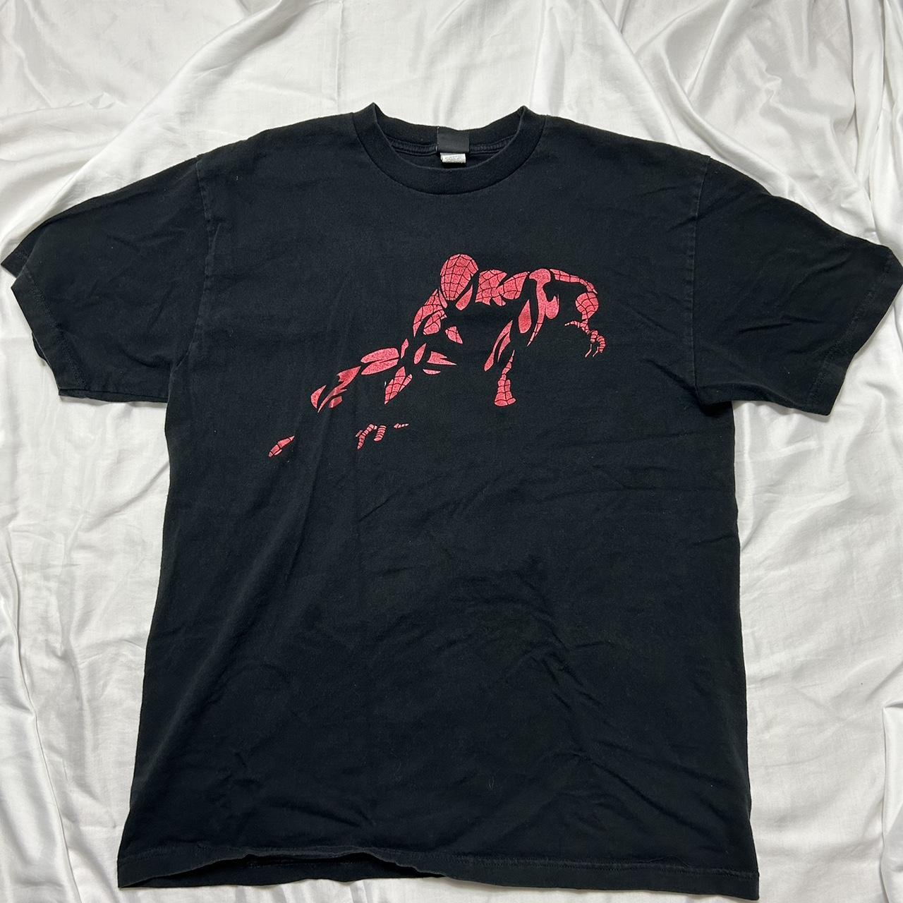 Black Spider-Man t shirt. No size on tag but fits... - Depop