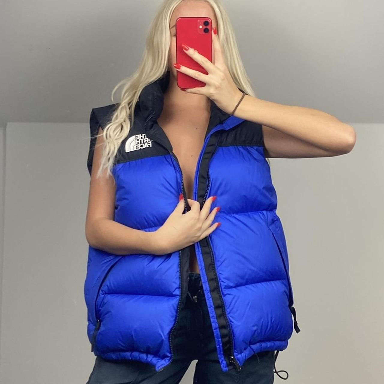 North face black and blue gilet puffer jacket Size... Depop