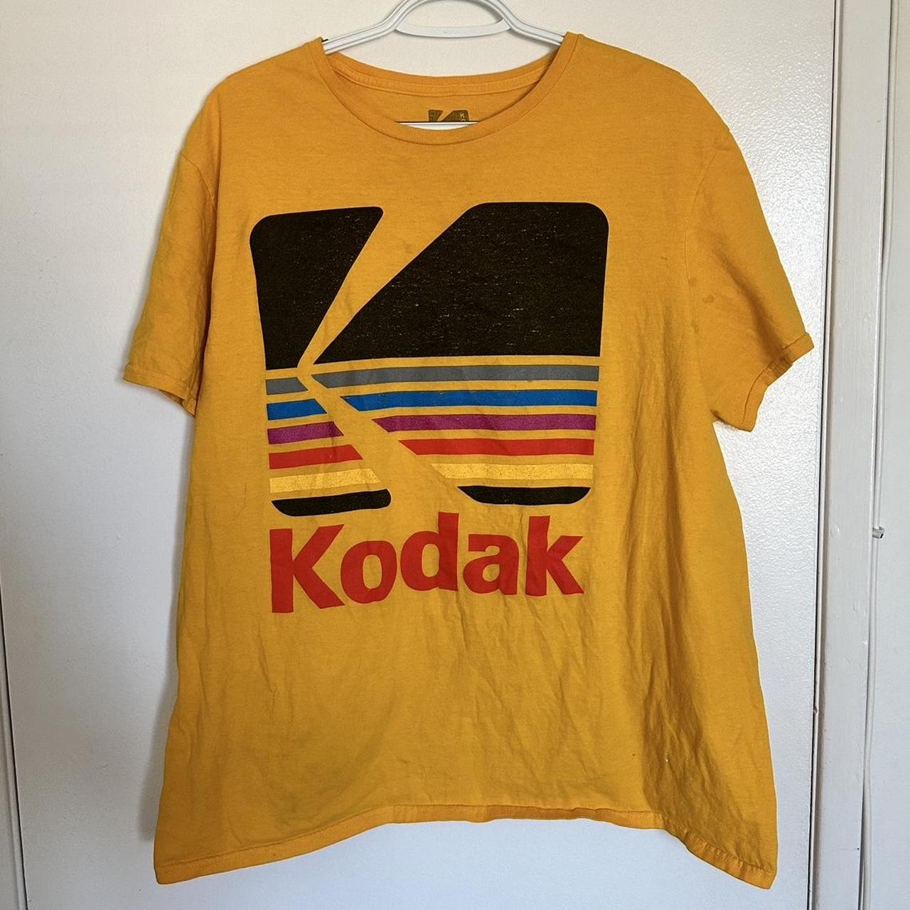 yellow kodak shirt