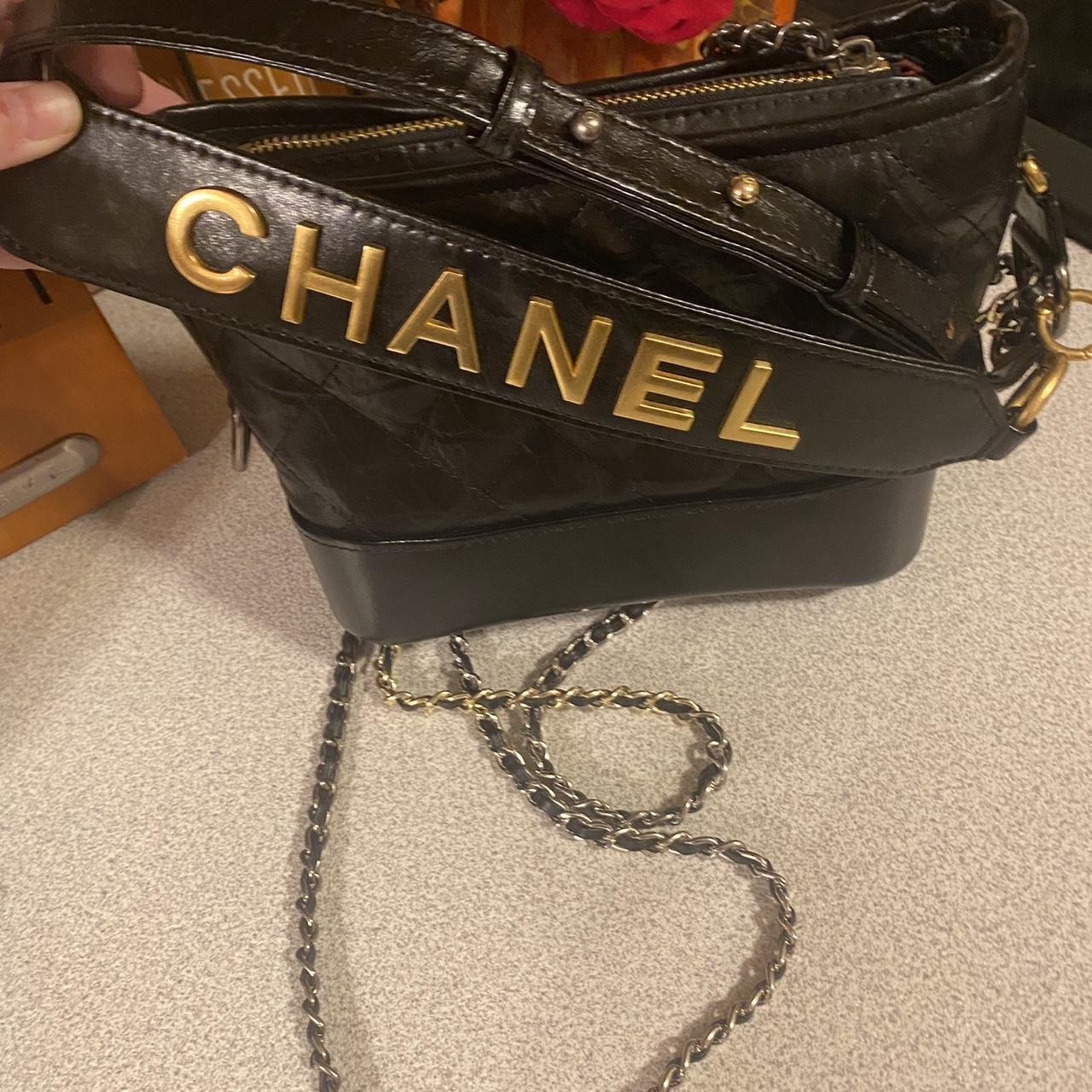 Chanel bag black leather - Depop