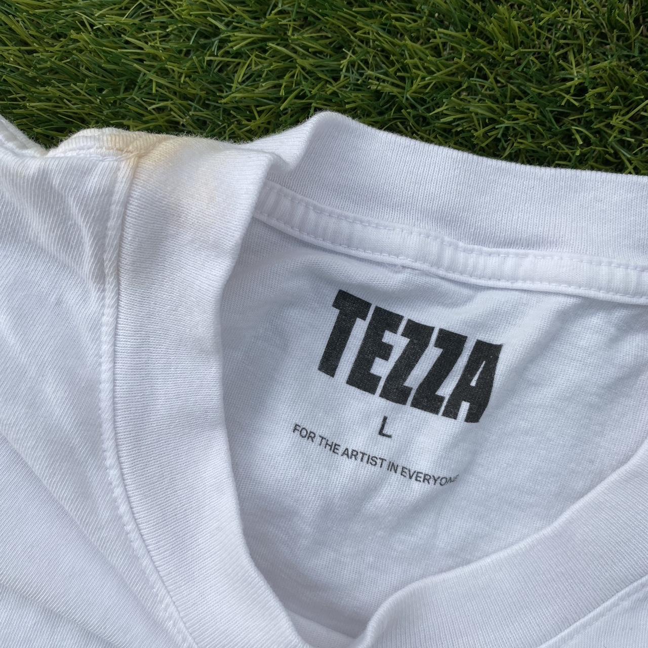 TEZZA artist graphic T-shirt Has stains on collar... - Depop