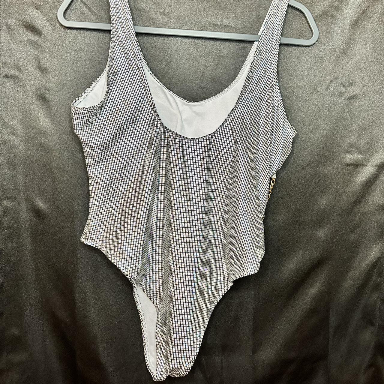 thong one piece bathing suit, size XL, never worn. - Depop