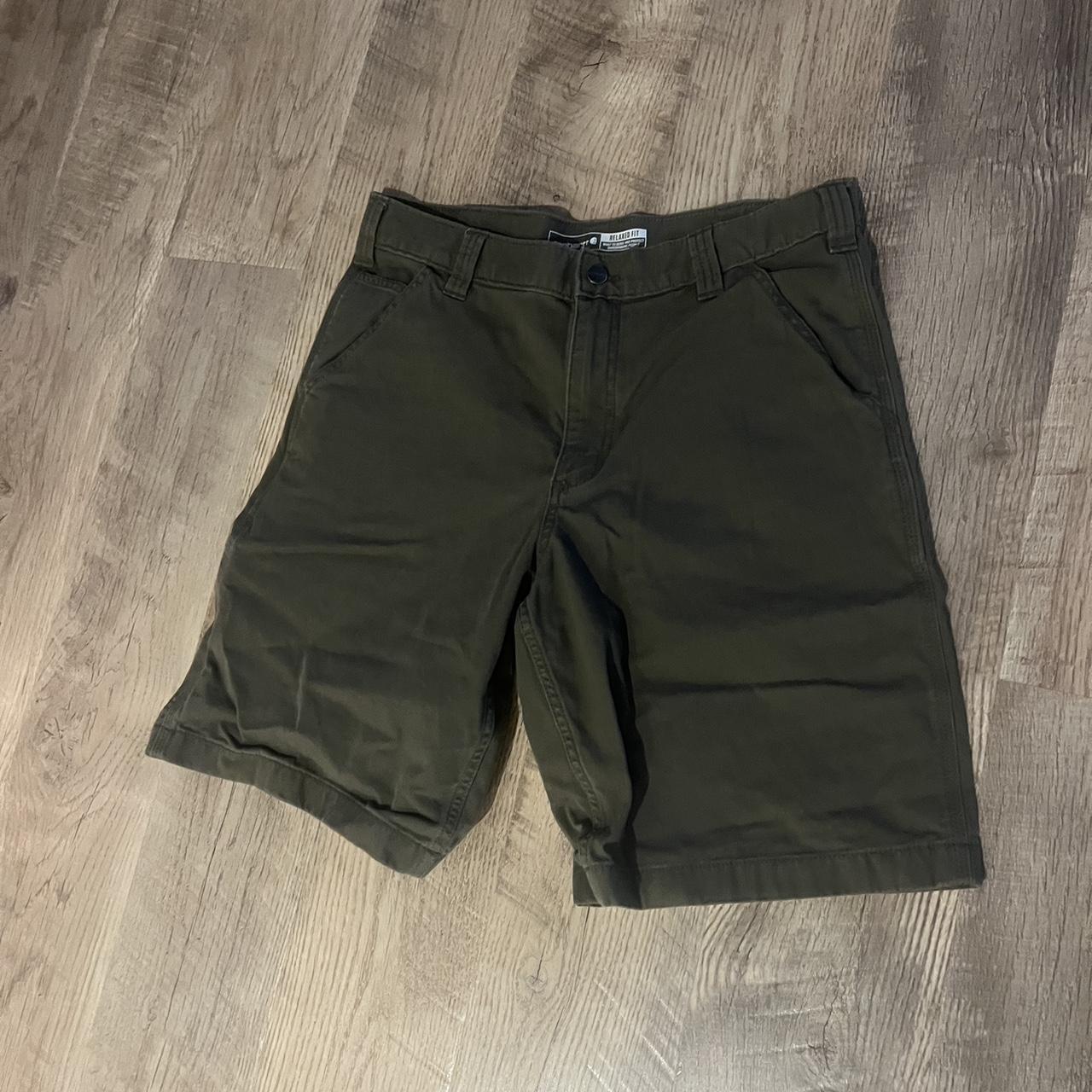 Men’s dark green carhartt jorts size 34 waist - Depop