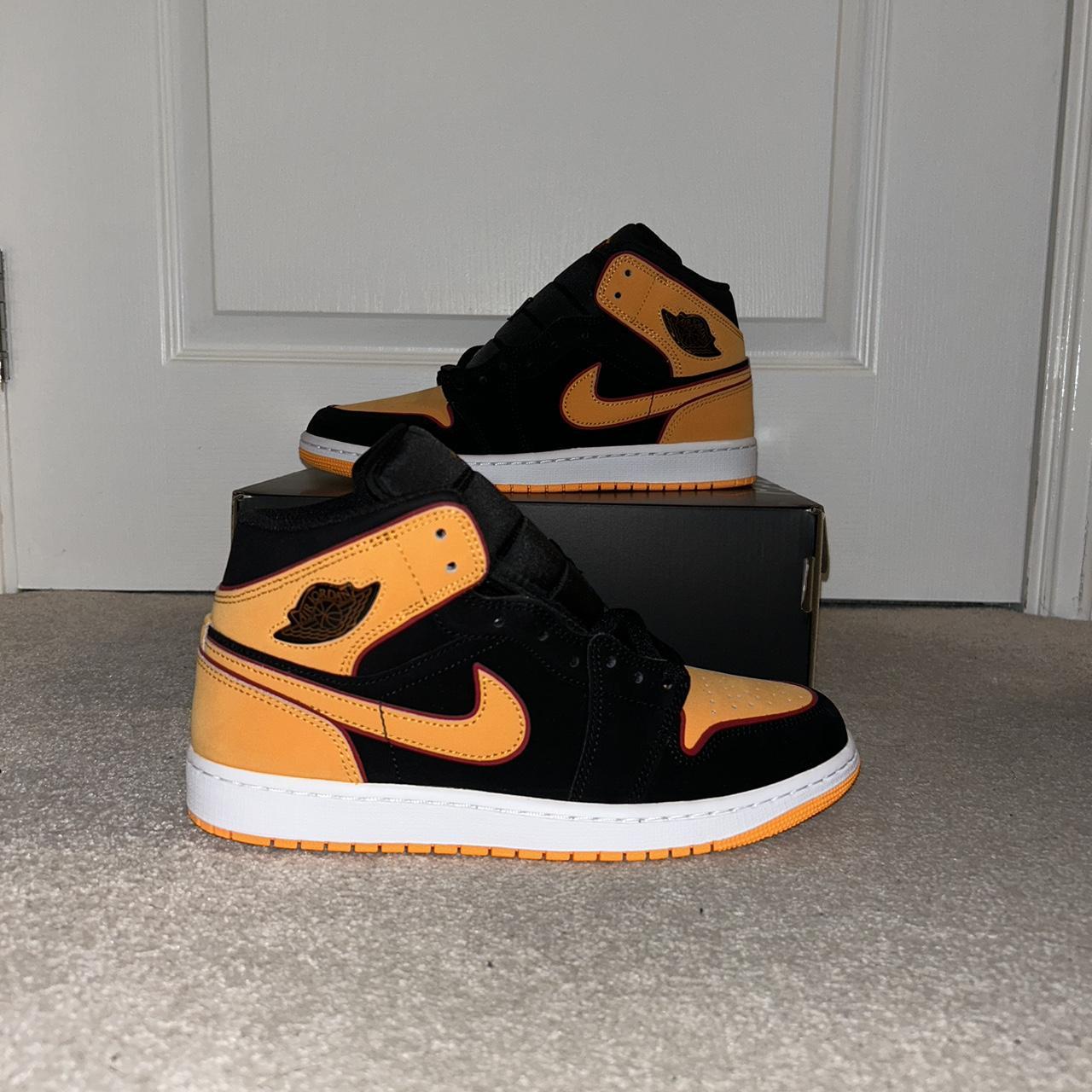 womens orange and black jordan 1
