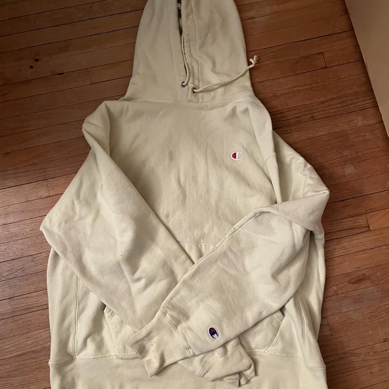 Light yellow champion hoodie Light blue stain