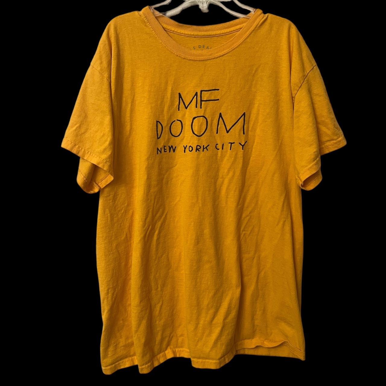 MF Doom ‘Pass The L” yellow graphic tee size... - Depop