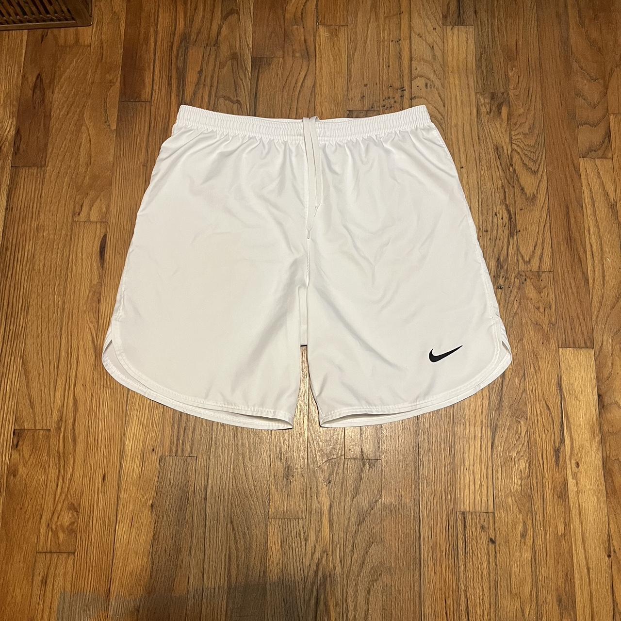 White Nike Shorts, slim fit, great condition with... Depop