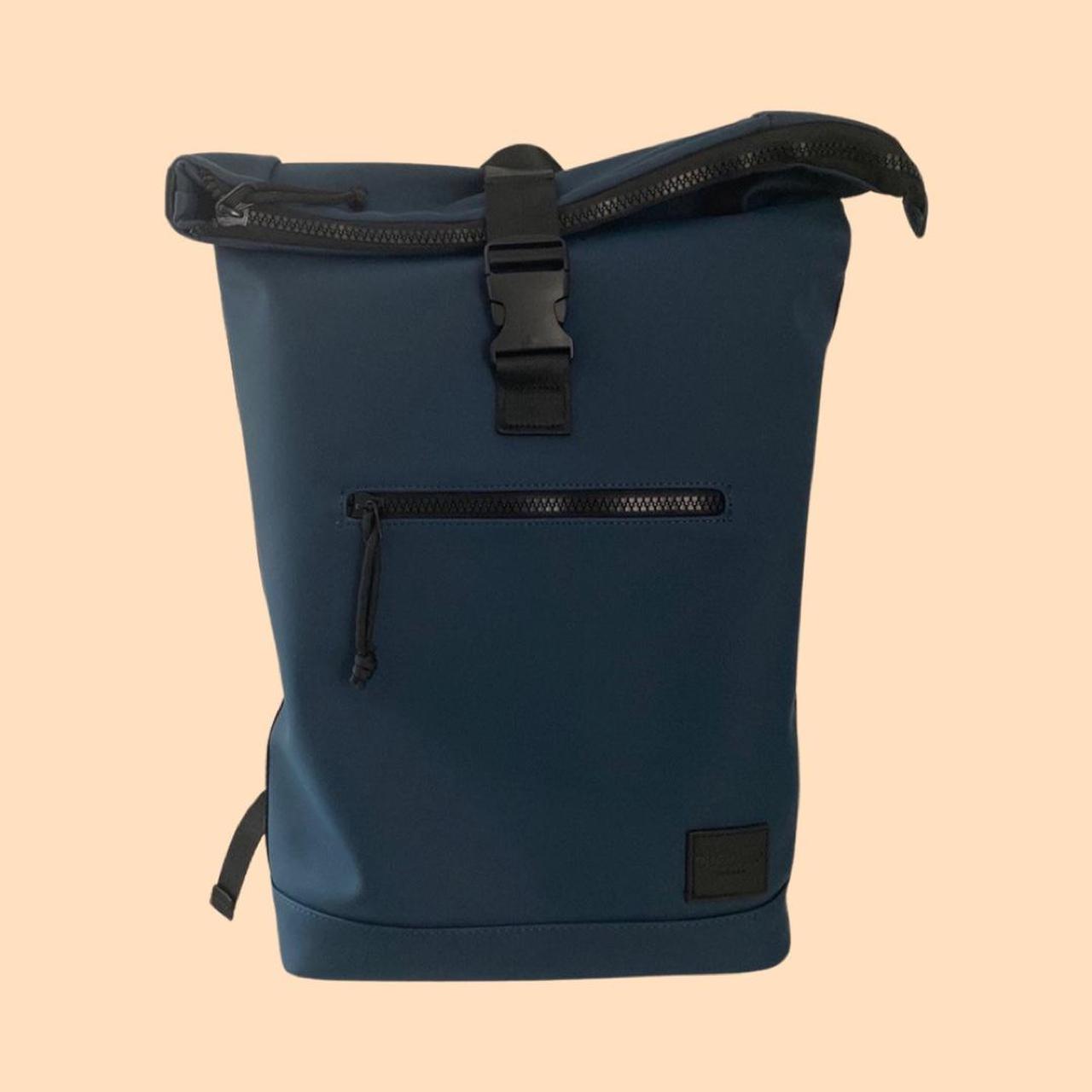 Duchamp London Rubberized Roll Top Backpack Depop