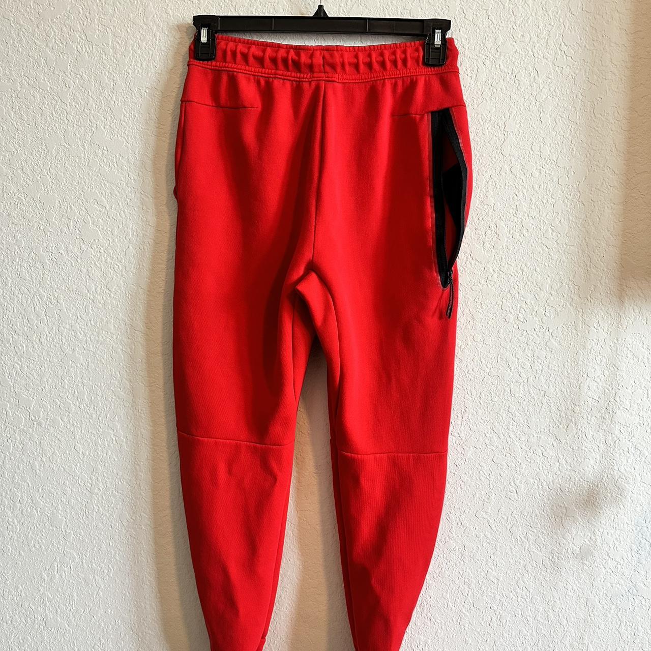 red nike tech pants