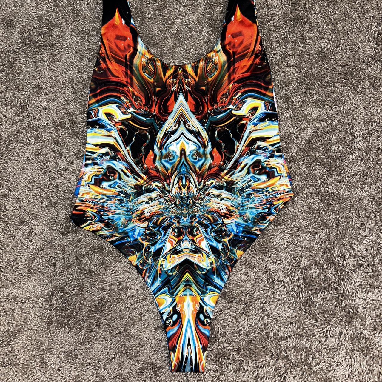 trippy reversible rave bodysuit NWOT it’s open... | Depop