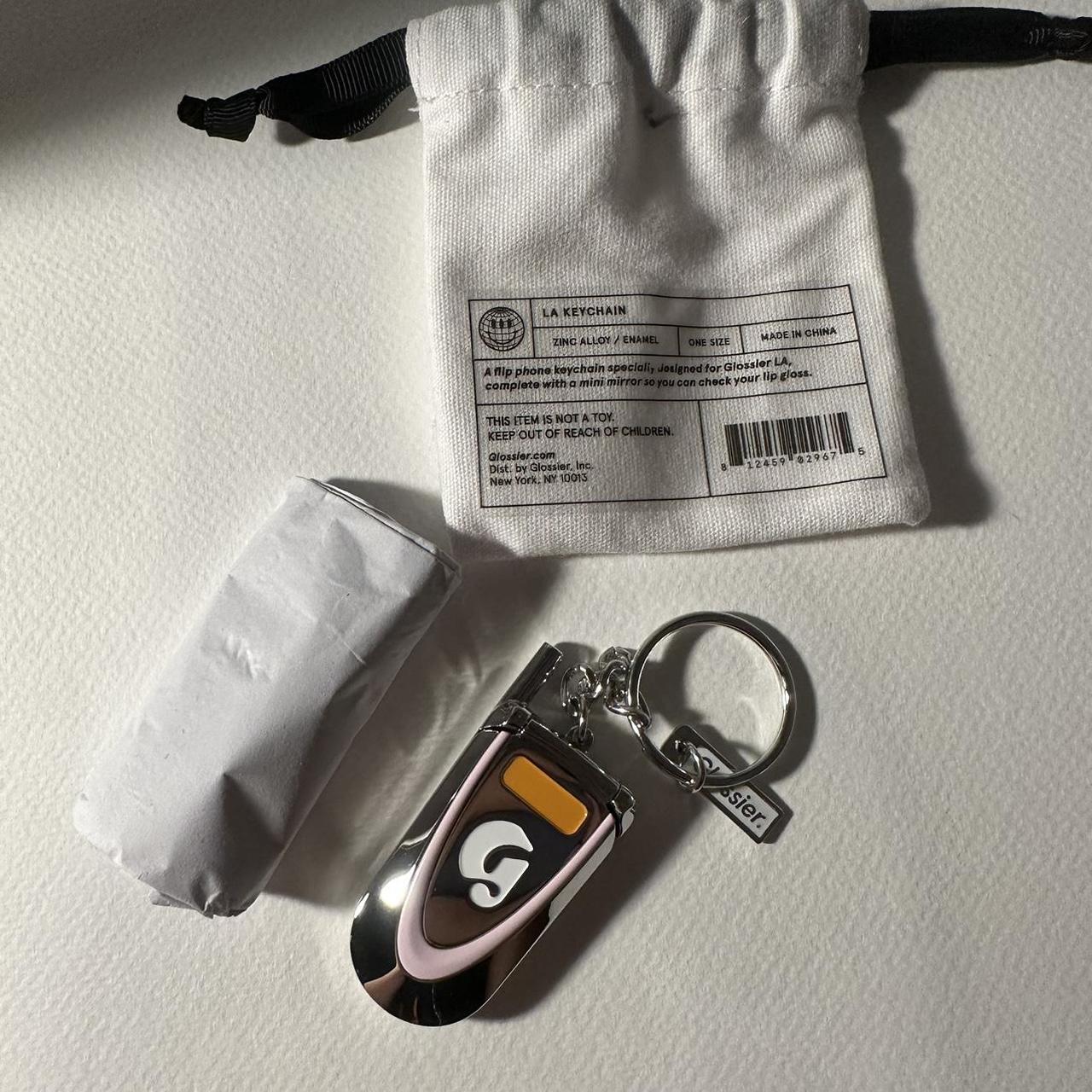 Glossier LA Keychain Brand new, in original... Depop